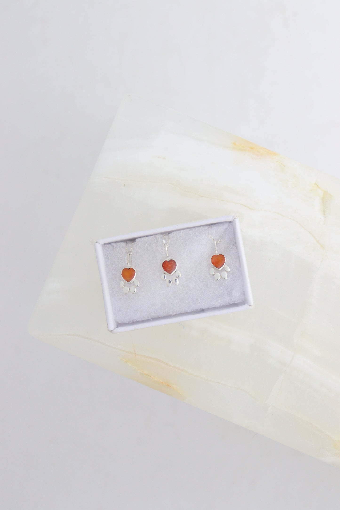 "Paw" Carnelian Pendants | Mi Esperanza Minerals | Supplier of Crystals and Onyx