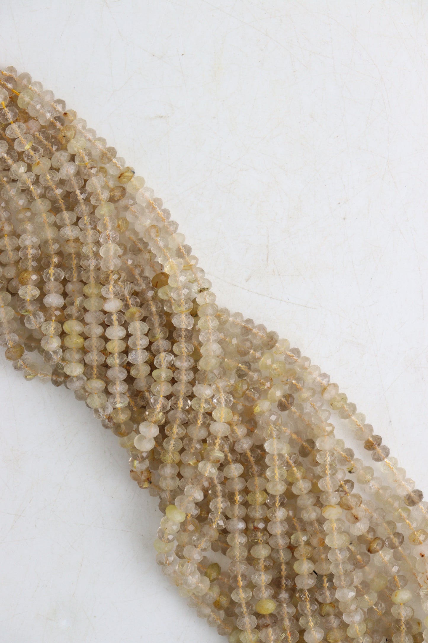 Golden Rutilated Quartz 5x8 mm Faceted Beads | Mi Esperanza Minerals | Supplier of Crystals and Onyx