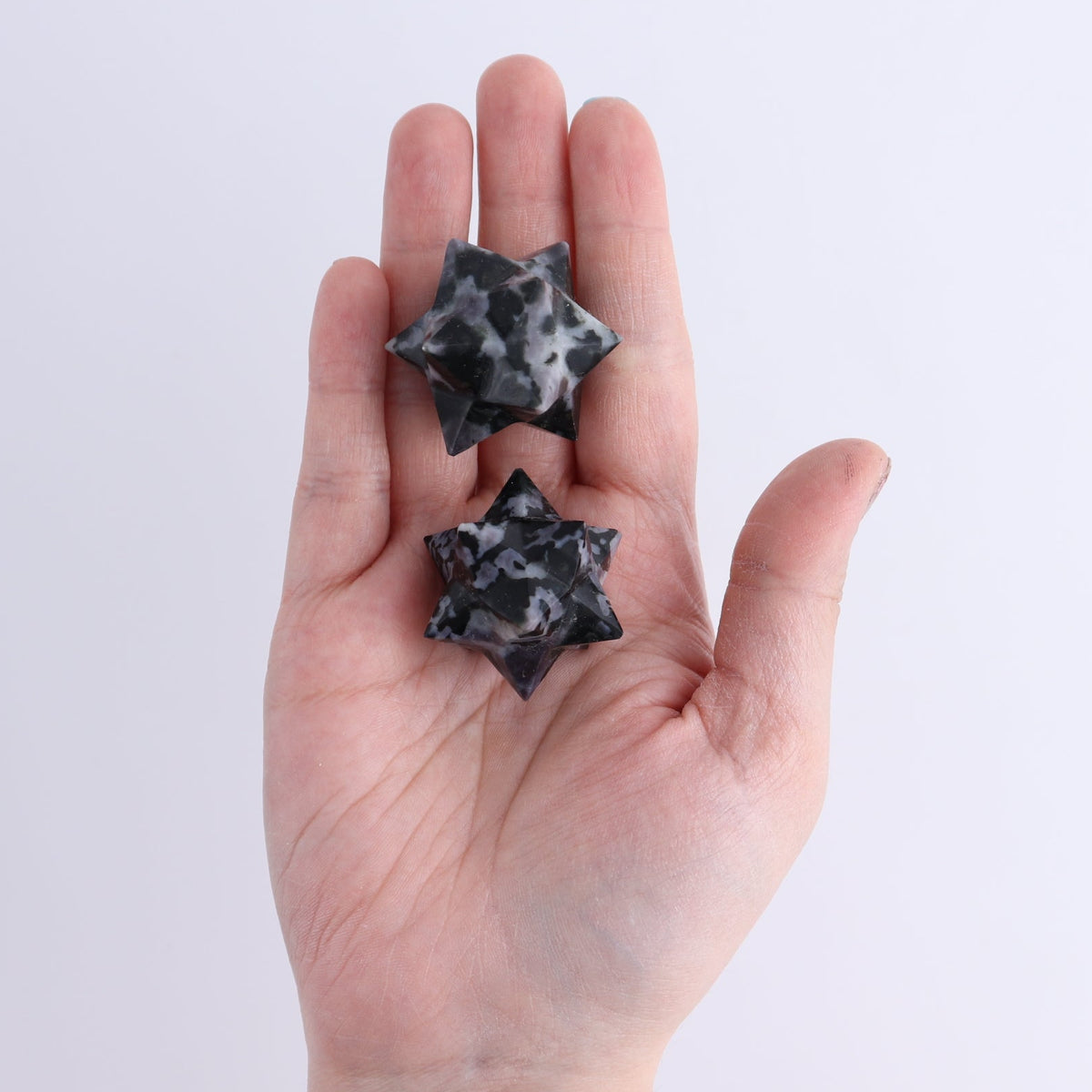 Indigo Gabbro Stars Set of 19 & 1 Cut Base Star | Mi Esperanza Minerals | Supplier of Crystals and Onyx