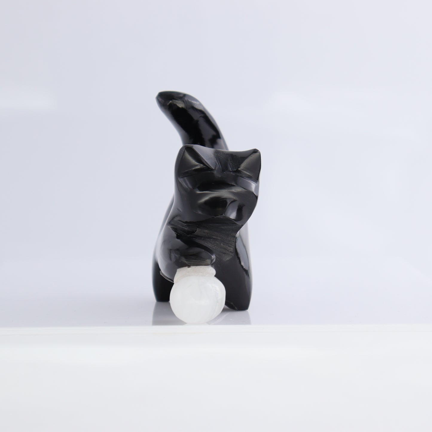 One Black Marble Cat Playing with Onyx Ball | Mi Esperanza Minerals | Supplier of Crystals and Onyx