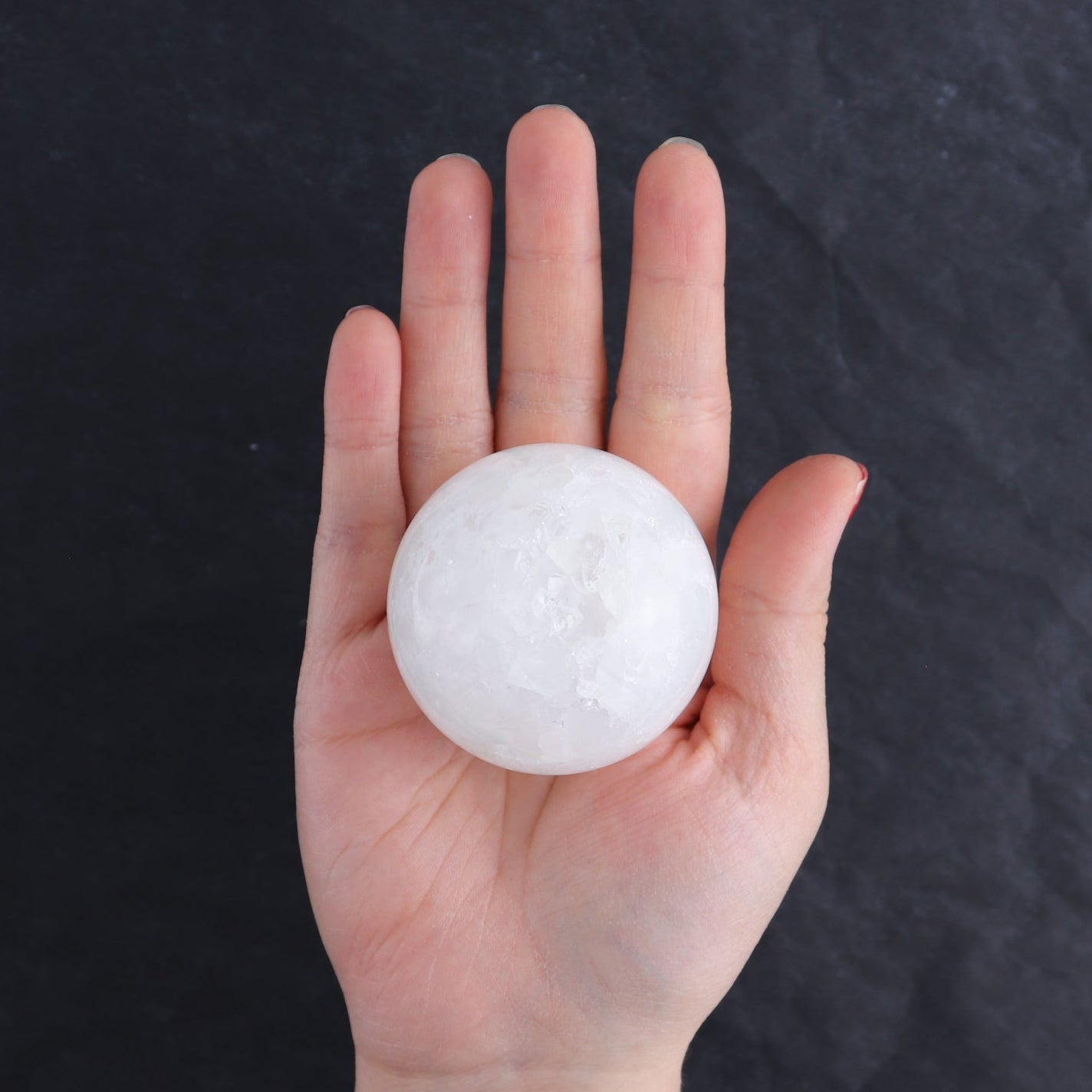 One Small White Quartz Sphere