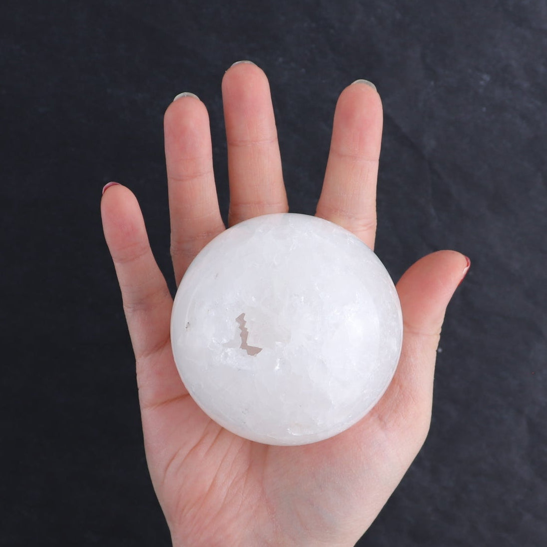 One Large White Quartz Sphere