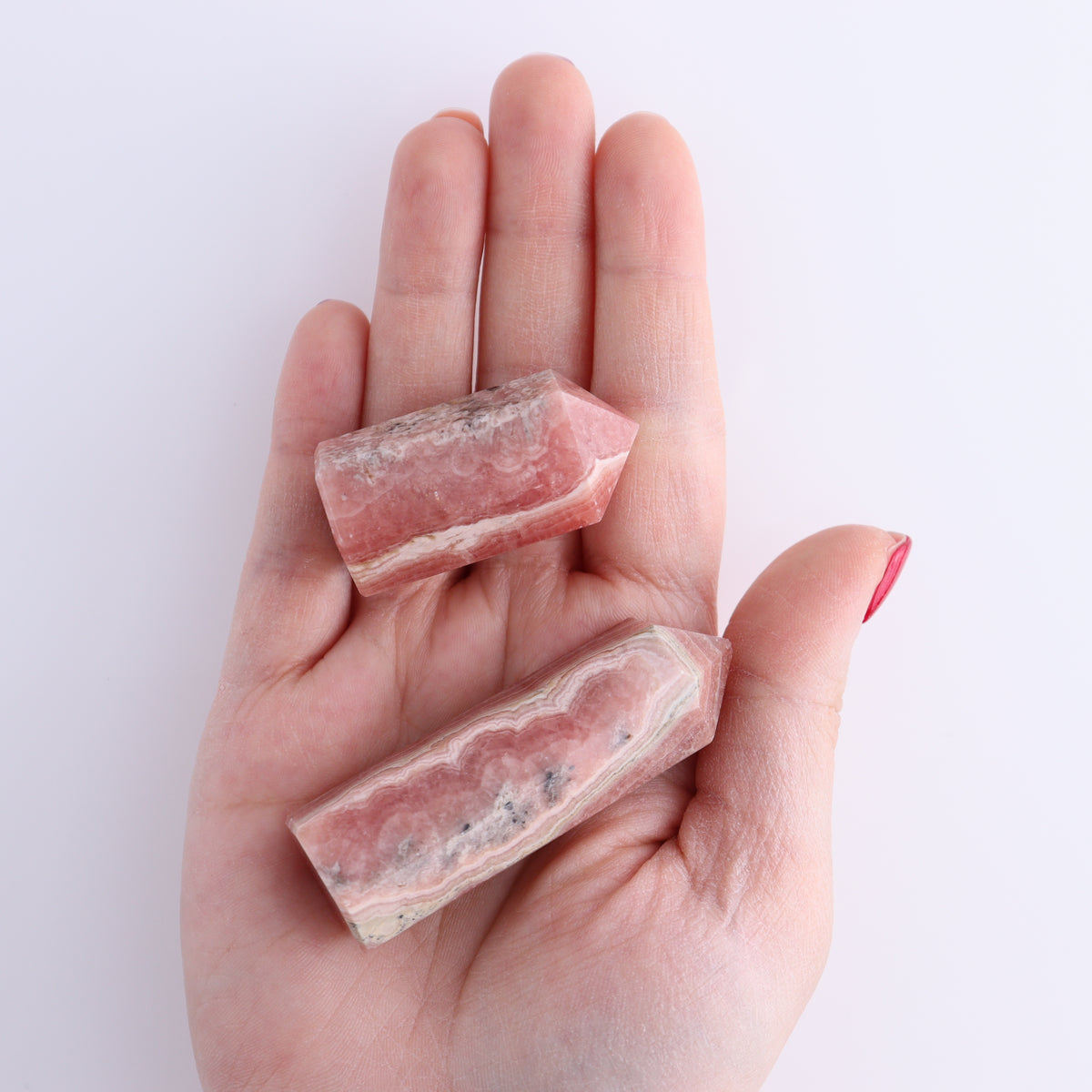 Rhodochrosite Towers Set of 8 | Mi Esperanza Minerals | Supplier of Crystals and Onyx