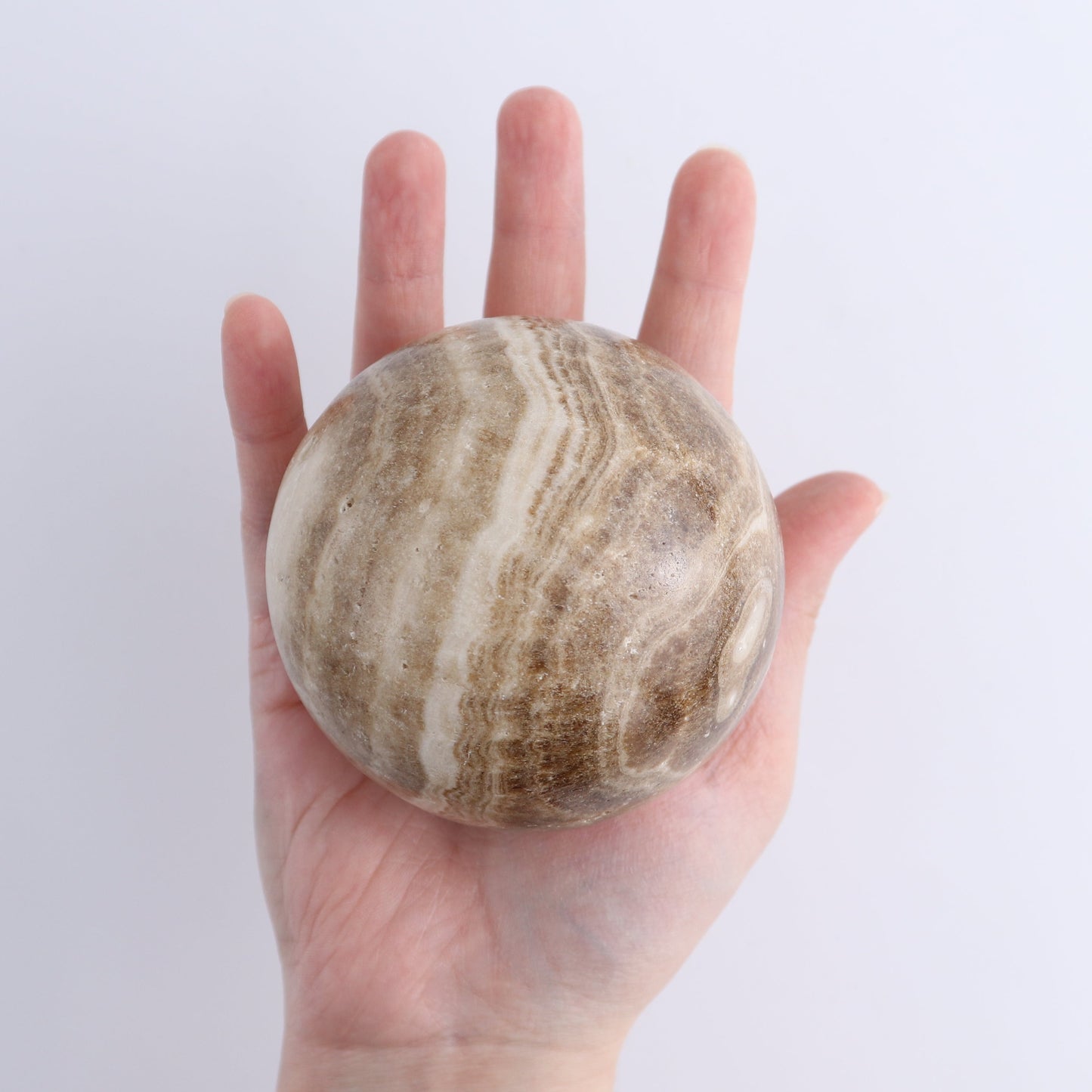 One Mexican Onyx/Calcite Chocolate Sphere 8 cm