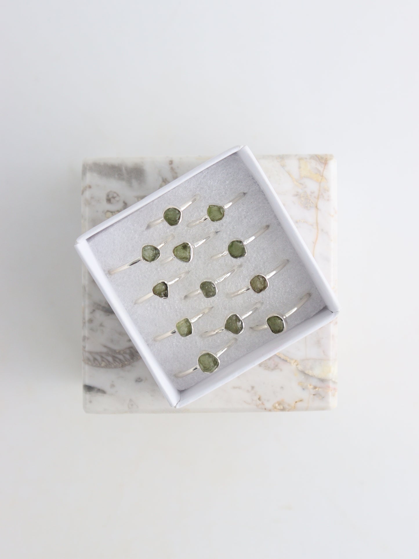 Sterling Silver Moldavite Rings Box of 12 | Mi Esperanza Minerals | Supplier of Crystals and Onyx