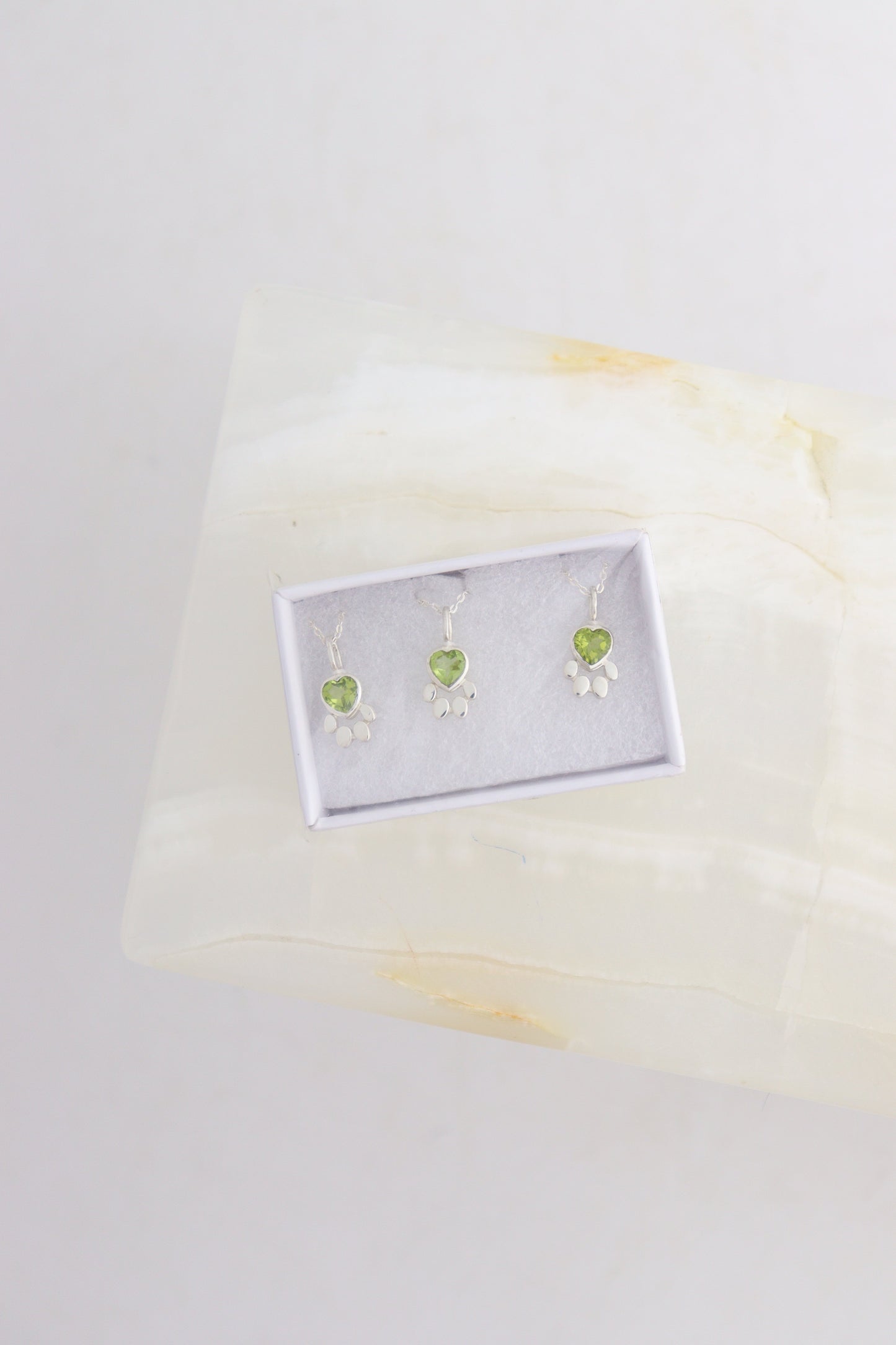 "Paw" Peridot Pendants | Mi Esperanza Minerals | Supplier of Crystals and Onyx