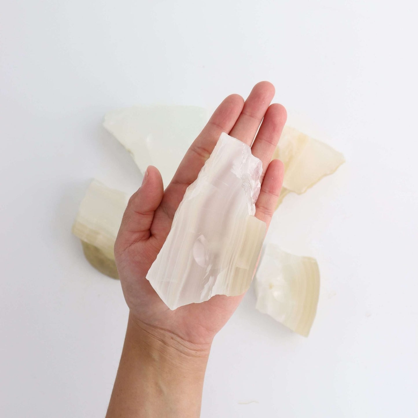 ONE White Onyx Sphere Holder | Mi Esperanza Minerals | Supplier of Crystals and Onyx