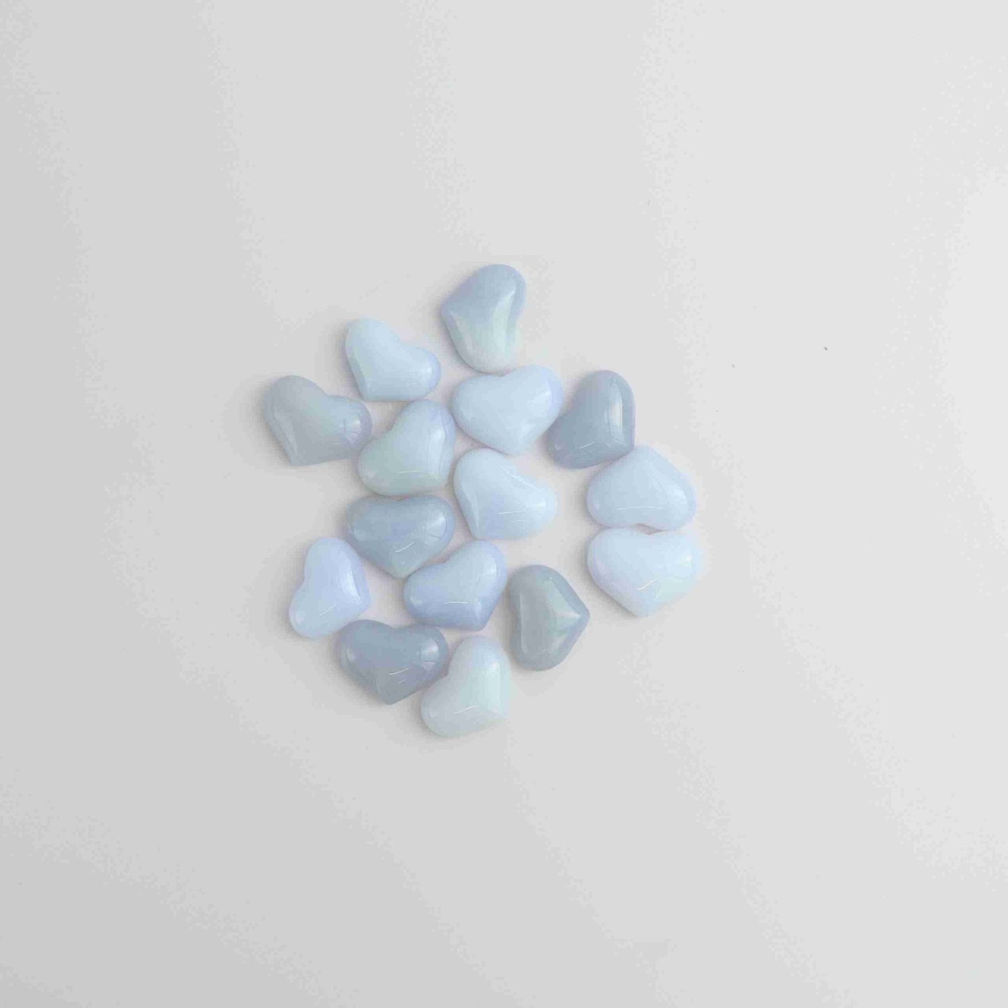 250g Blue Chalcedony Hearts Flat Back - Expert Vendor of Wholesale Crystals