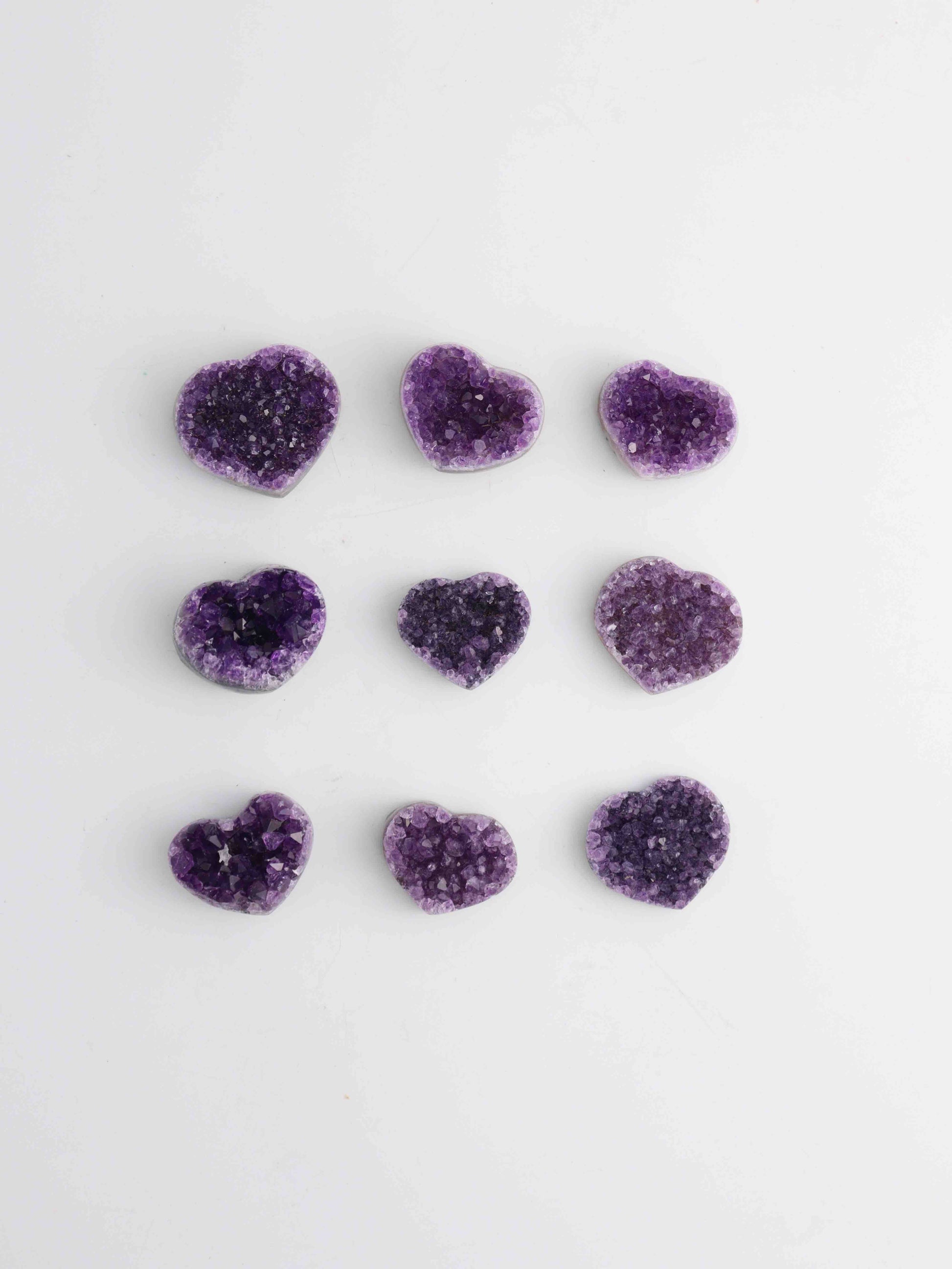 Amethyst Hearts 9 Pieces - Expert Wholesale and Supplier of Wholesale Crystals & Bulk Gemstones, ["Amethyst","Hearts"]