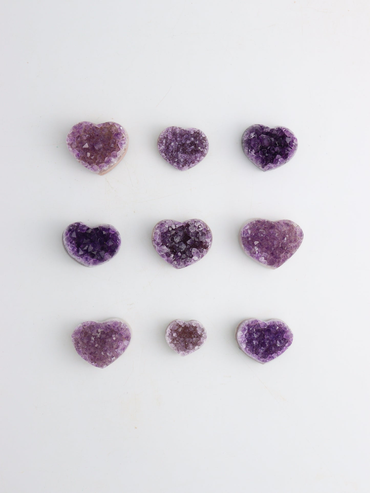 Amethyst hearts 9 Pieces - Expert Wholesale and Supplier of Wholesale Crystals & Bulk Gemstones, ["Amethyst","Hearts"]