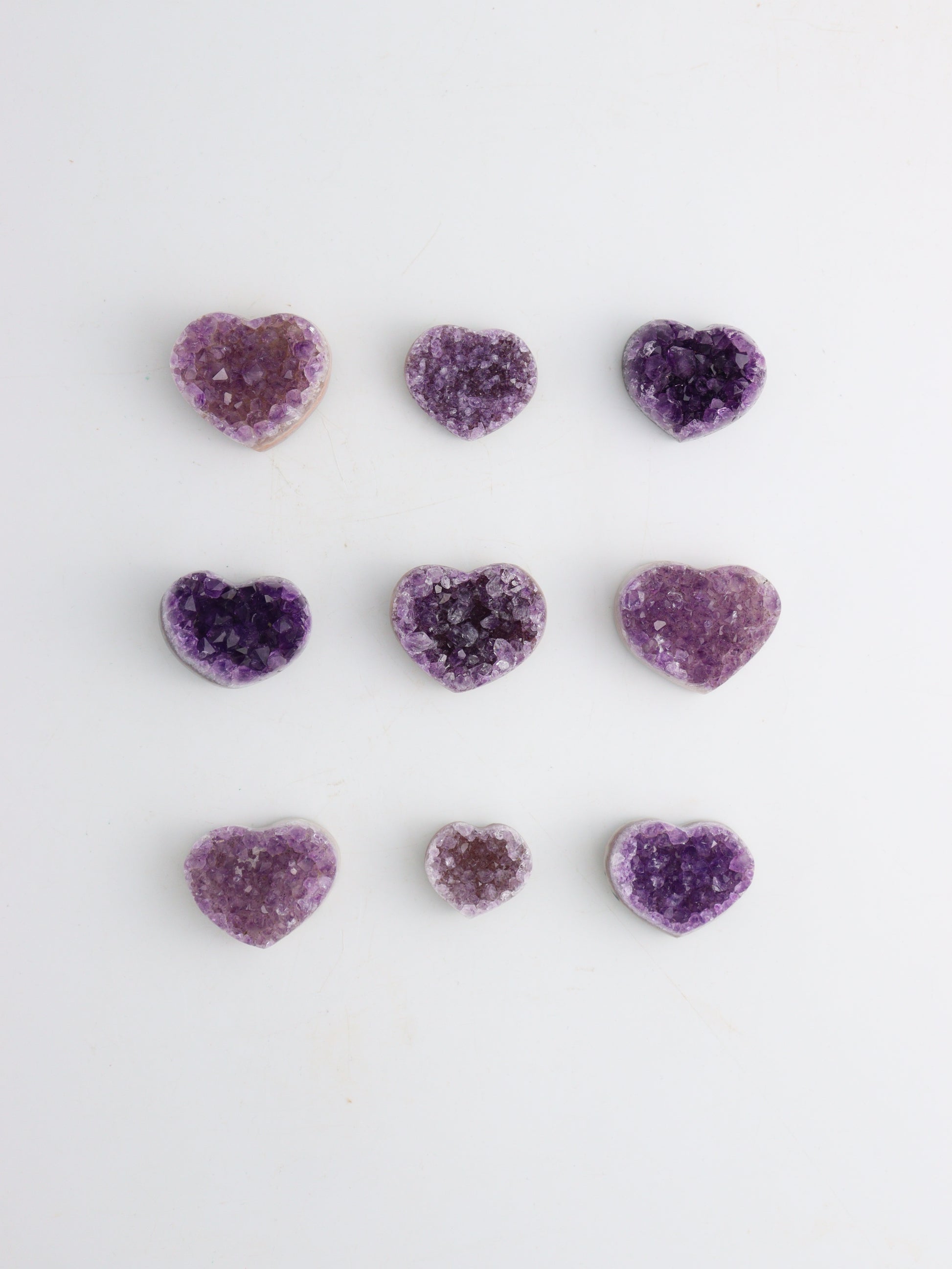 Amethyst hearts 9 Pieces - Expert Wholesale and Supplier of Wholesale Crystals & Bulk Gemstones, ["Amethyst","Hearts"]
