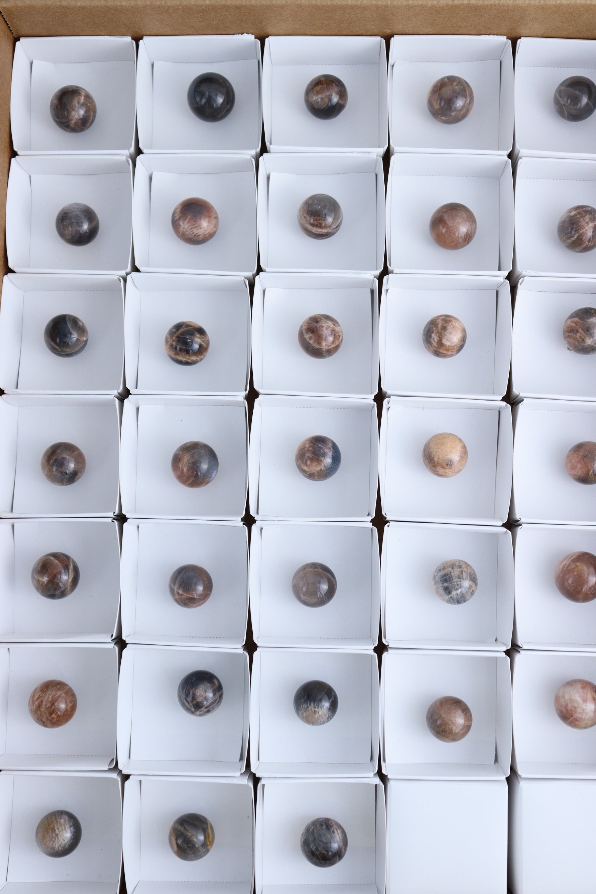 Black Moonstone Spheres - Expert Supplier of Wholesale Crystals & Bulk Gemstones