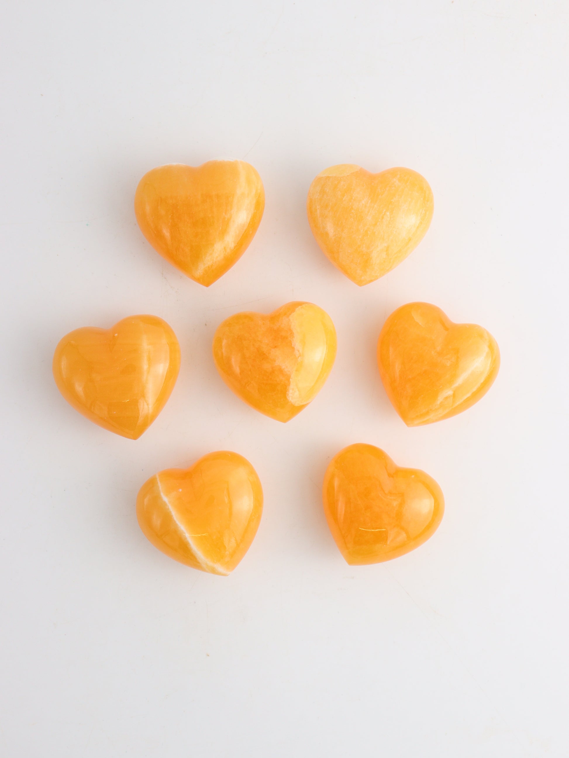 Calcite Hearts 7 Pieces - Expert Wholesale and Supplier of Wholesale Crystals & Bulk Gemstones, ["Calcite","Hearts"]