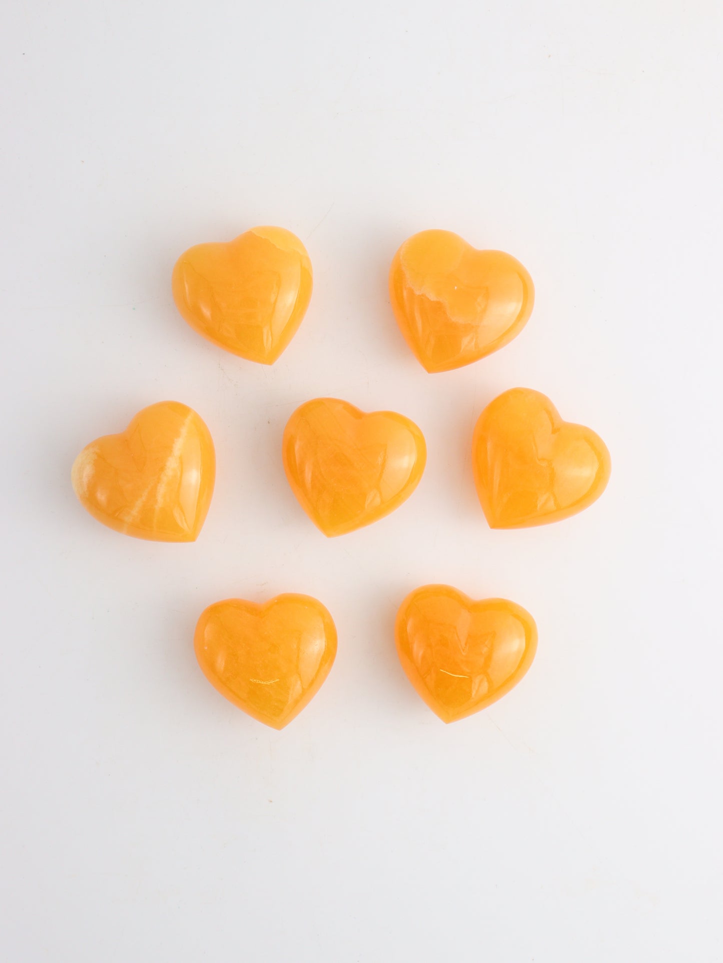Calcite Hearts 7 Pieces - Expert Wholesale and Supplier of Wholesale Crystals & Bulk Gemstones, ["Calcite","Hearts"]