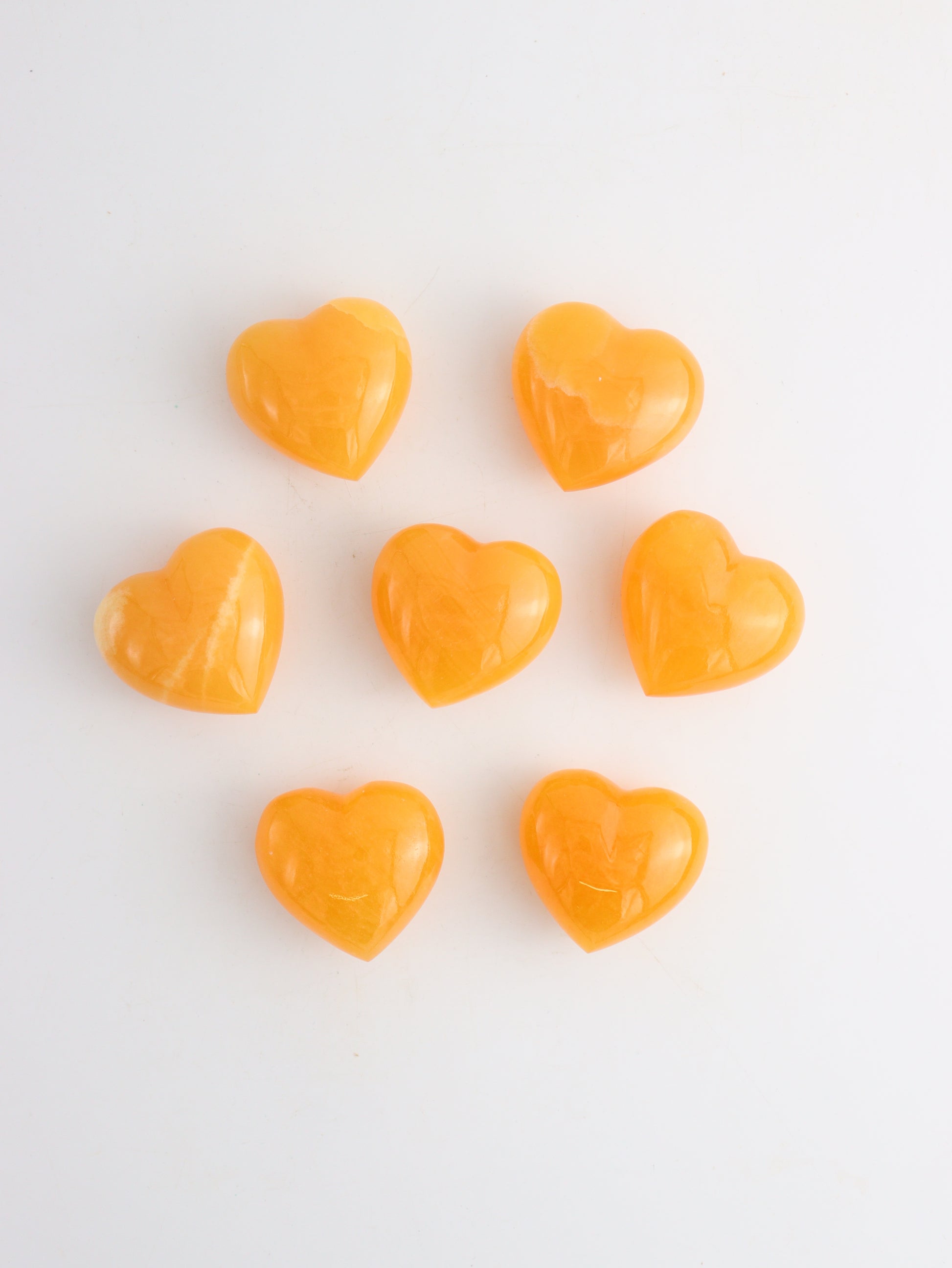 Calcite Hearts 7 Pieces - Expert Wholesale and Supplier of Wholesale Crystals & Bulk Gemstones, ["Calcite","Hearts"]