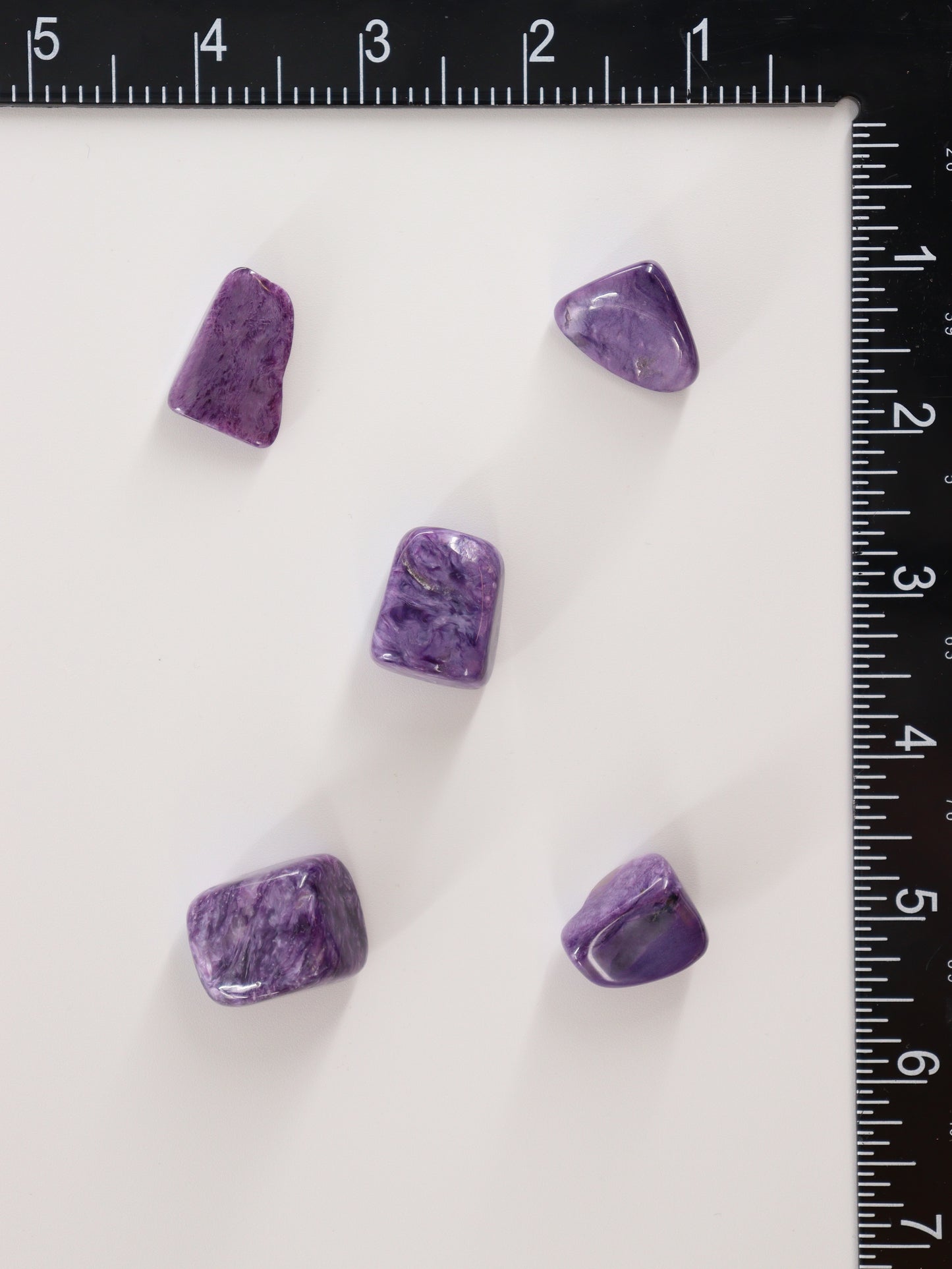 Charoite Tumbles - Expert Supplier of Wholesale Crystals & Bulk Gemstones