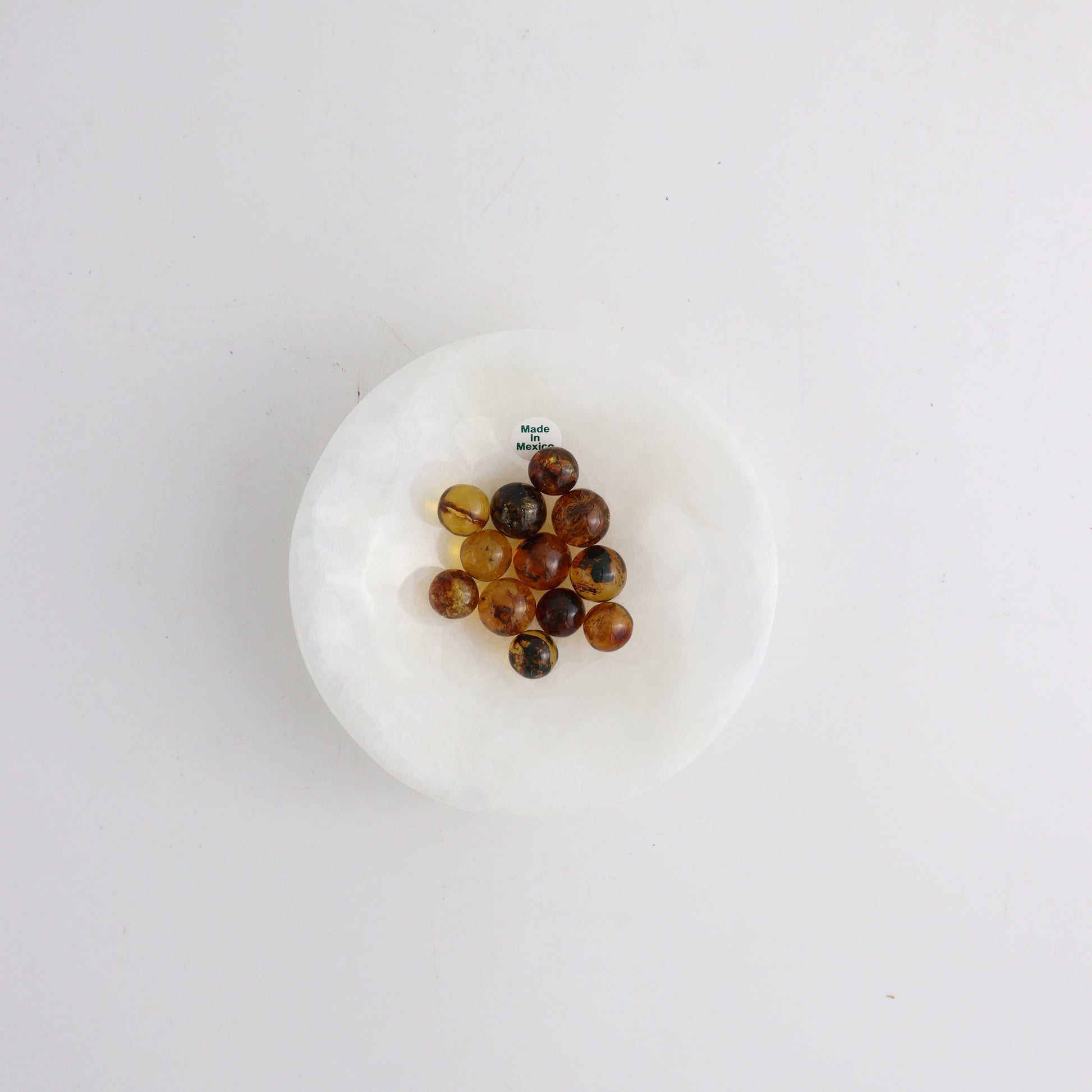 Chiapas Amber Mini Spheres - Expert Wholesale and Supplier of Wholesale Crystals & Bulk Gemstones, ["Chiapas Amber","Freeforms","Mexico","Mixed Carvings","Spheres"]