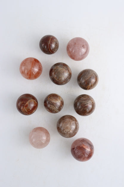 Fire Quartz Spheres Set of 11 - Expert Supplier of Wholesale Crystals & Bulk Gemstones