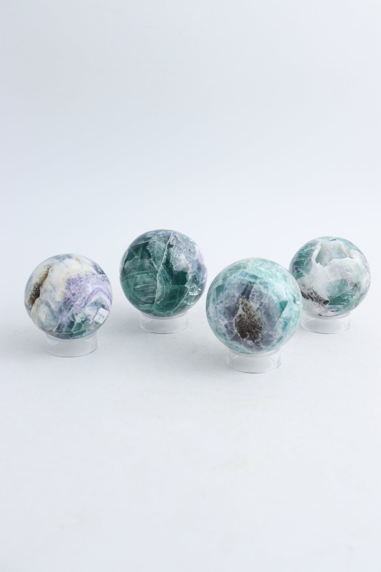 Four Fluorite Spheres - Expert Wholesale and Supplier of Wholesale Crystals & Bulk Gemstones, ["Fluorite","Mexico","Shapes"]