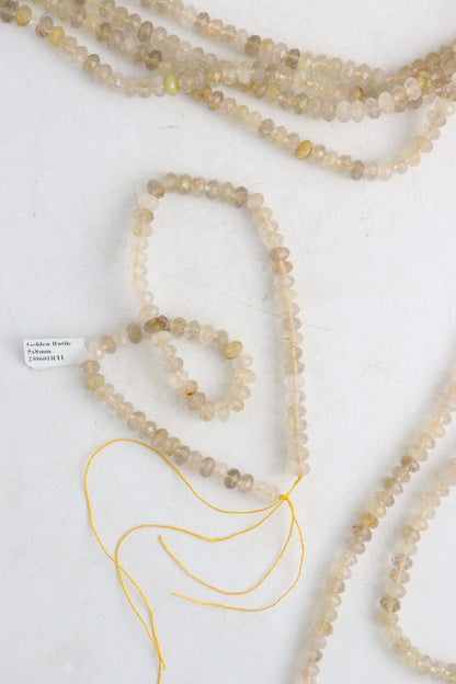 Golden Rutilated Quartz 5x8 mm Faceted Beads