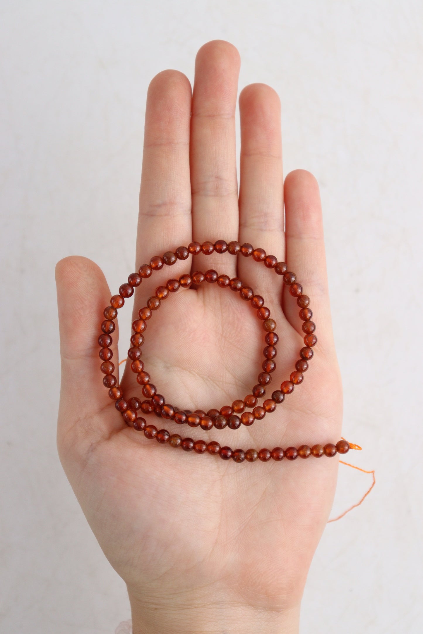 Hessonite Garnet 4mm Round Beads - Expert Wholesale and Supplier of Wholesale Crystals & Bulk Gemstones, []