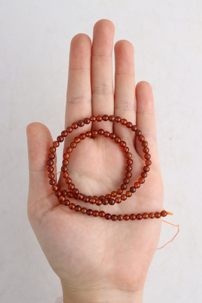 Hessonite Garnet 4mm Round Beads - Expert Wholesale and Supplier of Wholesale Crystals & Bulk Gemstones, []
