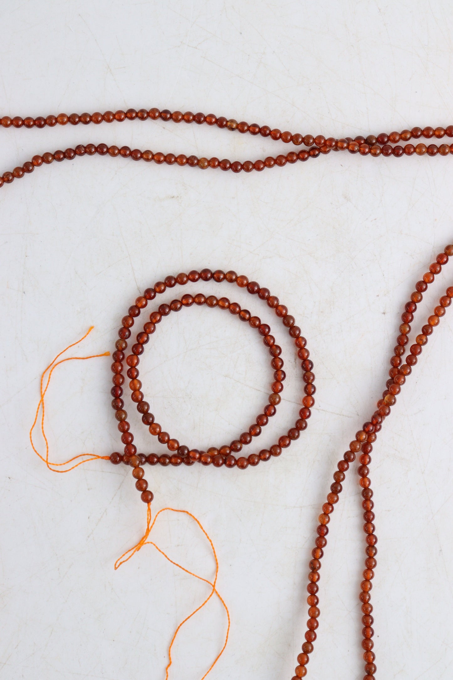 Hessonite Garnet 4mm Round Beads - Expert Wholesale and Supplier of Wholesale Crystals & Bulk Gemstones, []
