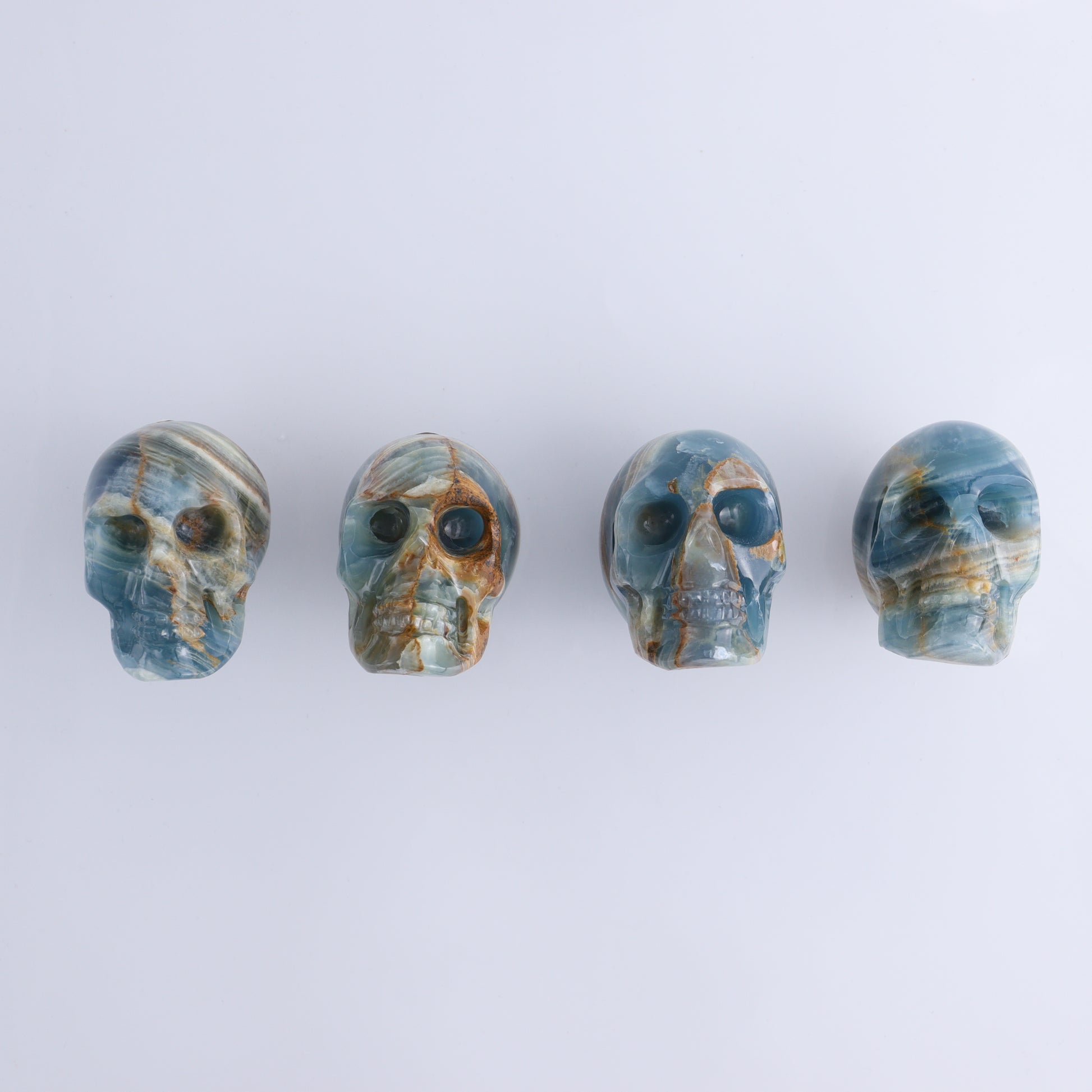 Onyx Skulls Set of 4 - Expert Wholesale and Supplier of Wholesale Crystals & Bulk Gemstones, ["Mexico","onyx","Skulls"]