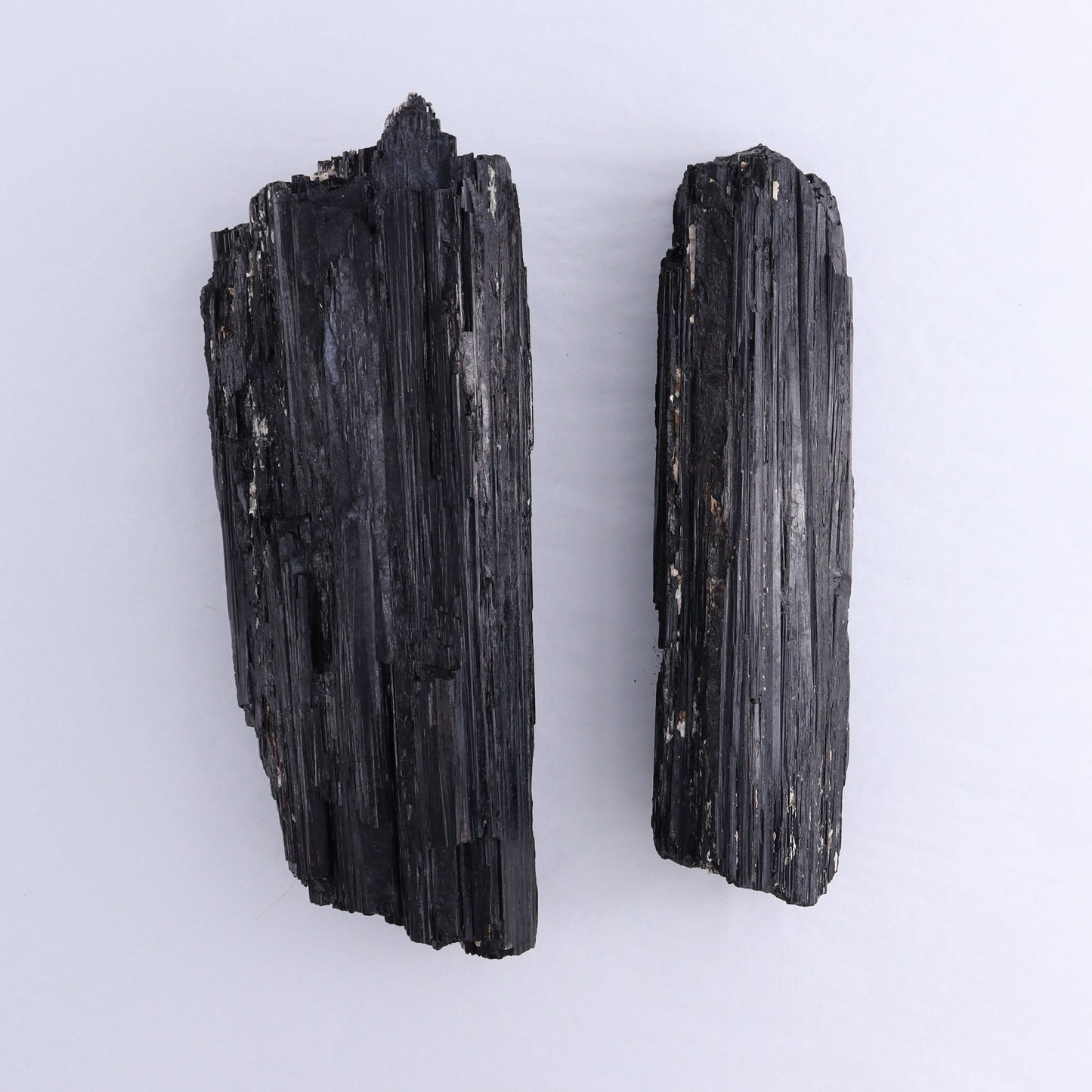 Black Tourmaline Log Set of 2 - Expert Wholesale and Supplier of Wholesale Crystals & Bulk Gemstones, ["Black Tourmaline","logs","Madagascar","Rough","Tourmaline"]