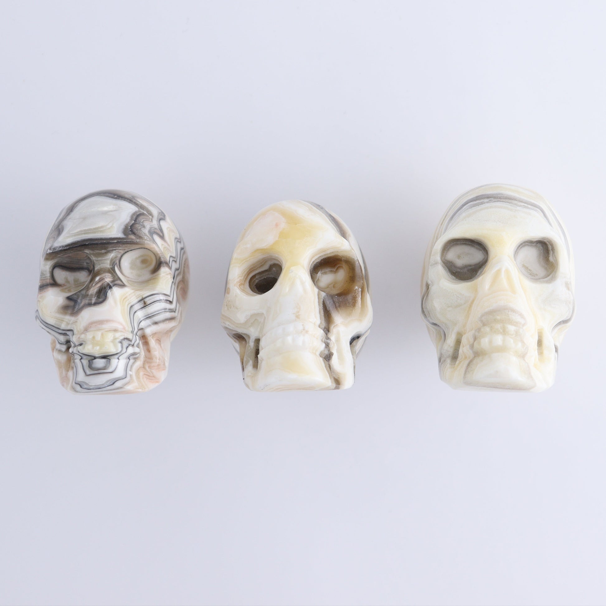 Onyx Skulls Set of 3 - Expert Wholesale and Supplier of Wholesale Crystals & Bulk Gemstones, ["Mexico","onyx","Skulls"]