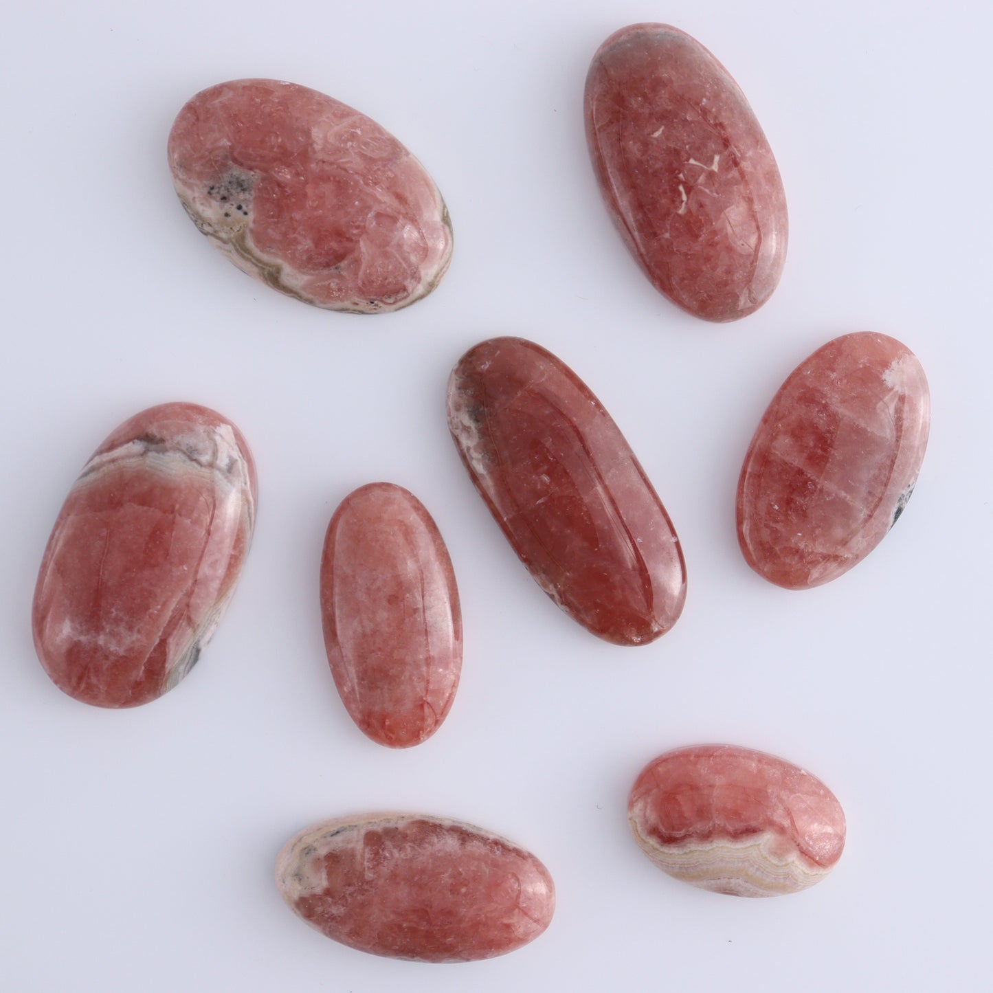 Rhodochrosite Oval Cabs Set of 8 - Expert Wholesale and Supplier of Wholesale Crystals & Bulk Gemstones, ["Argentina","Cabs","Oval","Rhodochrosite"]