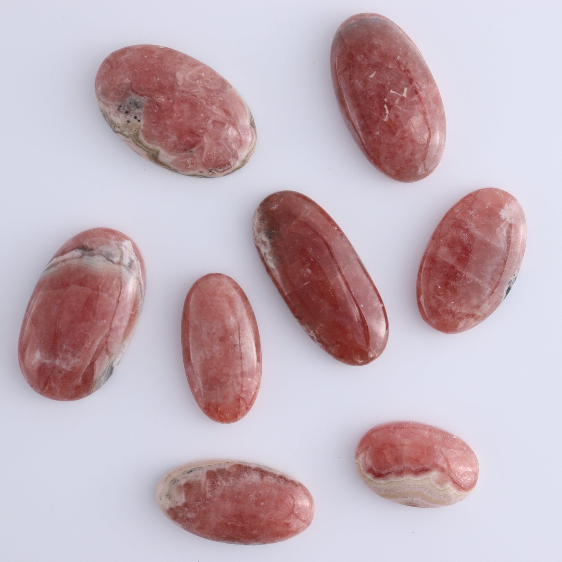Rhodochrosite Oval Cabs Set of 8 - Expert Wholesale and Supplier of Wholesale Crystals & Bulk Gemstones, ["Argentina","Cabs","Oval","Rhodochrosite"]