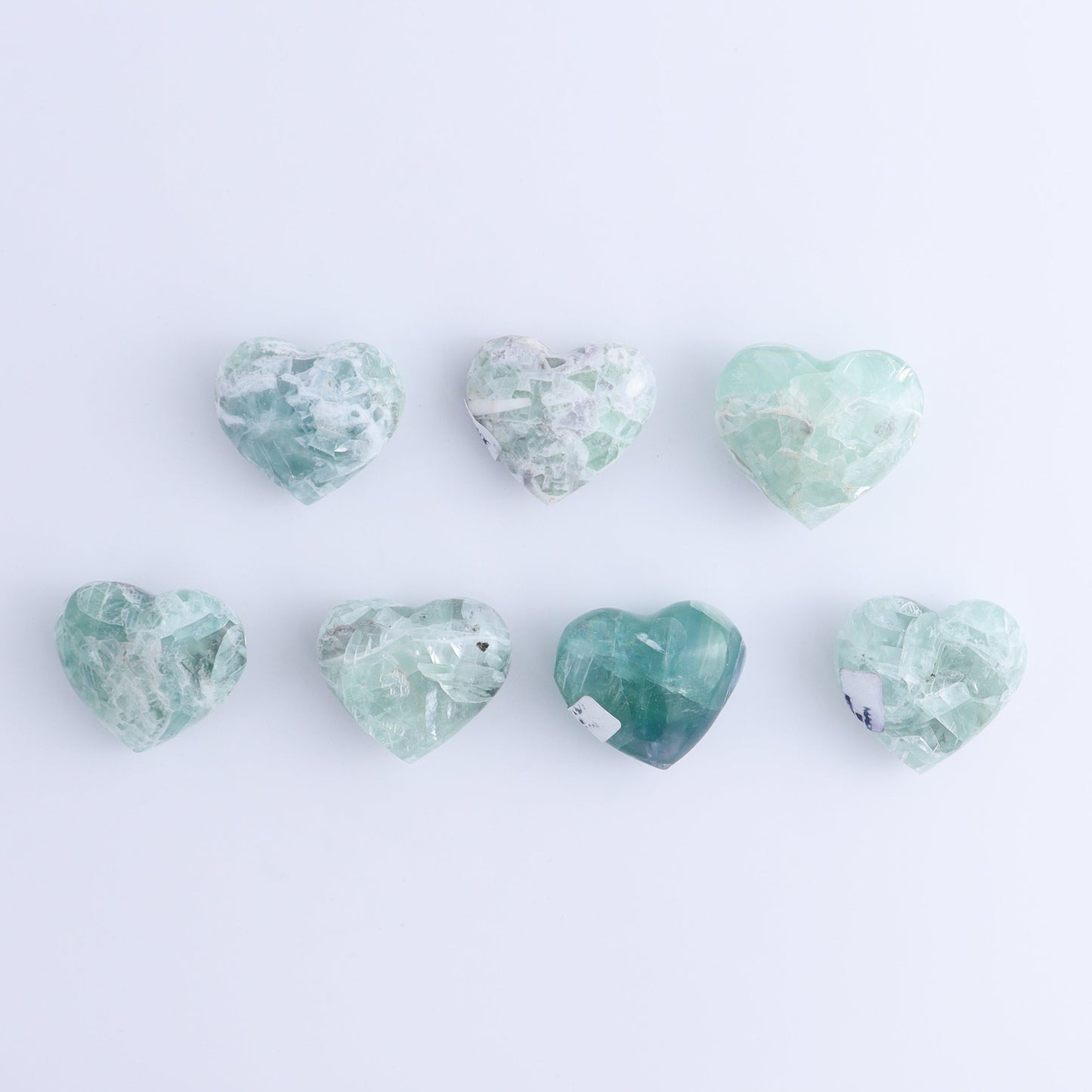 Fluorite Hearts Set of 7 - Expert Wholesale and Supplier of Wholesale Crystals & Bulk Gemstones, ["Fluorite","Hearts","Mexico"]
