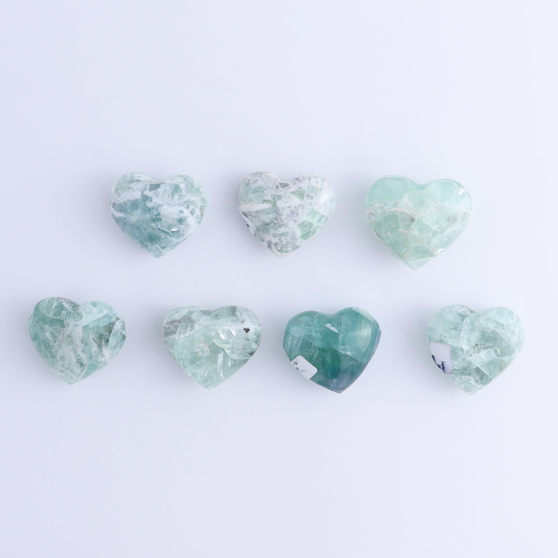 Fluorite Hearts Set of 7 - Expert Wholesale and Supplier of Wholesale Crystals & Bulk Gemstones, ["Fluorite","Hearts","Mexico"]