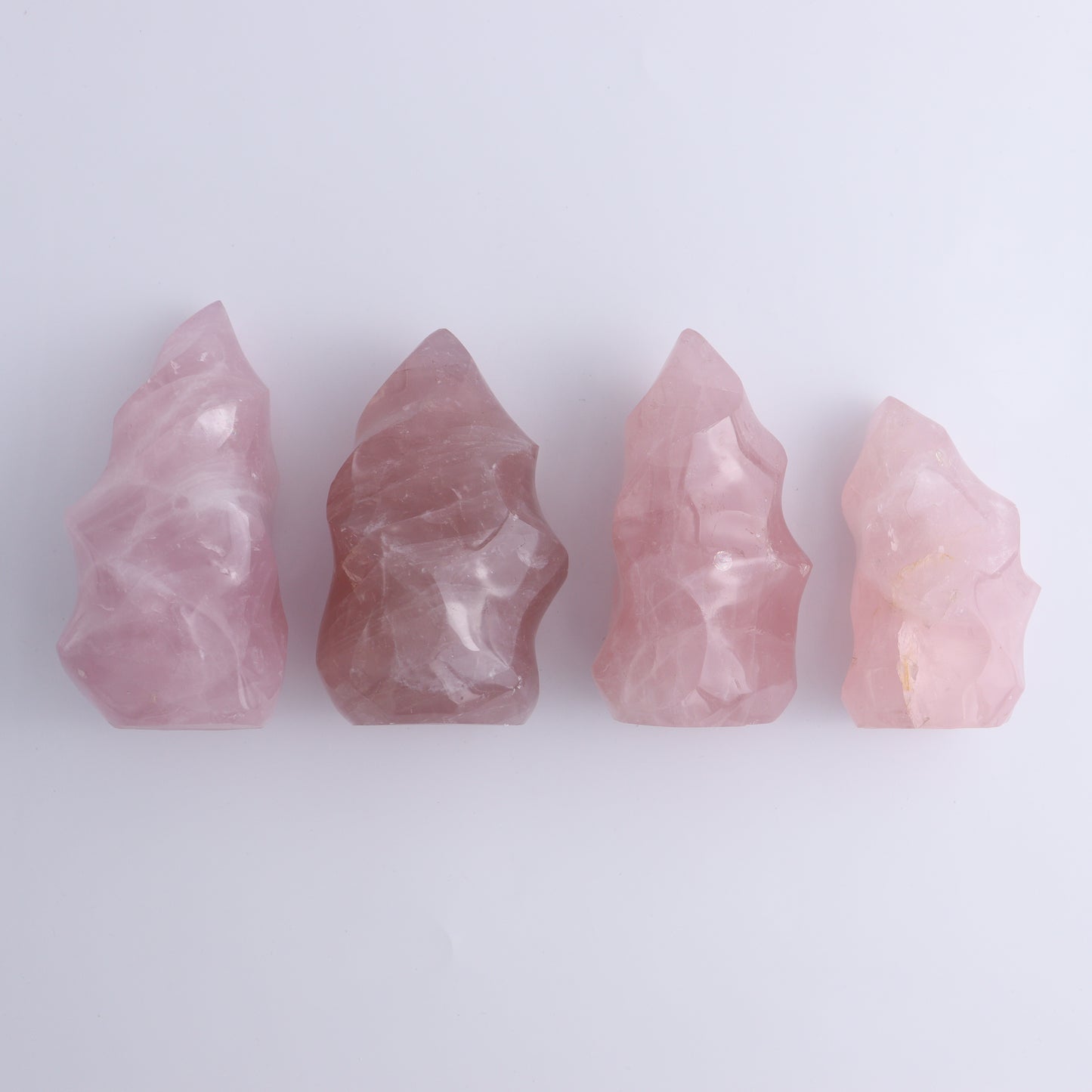 Rose Quartz Flames Set of 4 - Expert Wholesale and Supplier of Wholesale Crystals & Bulk Gemstones, ["flames","Madagascar","Quartz","Rose Quartz"]