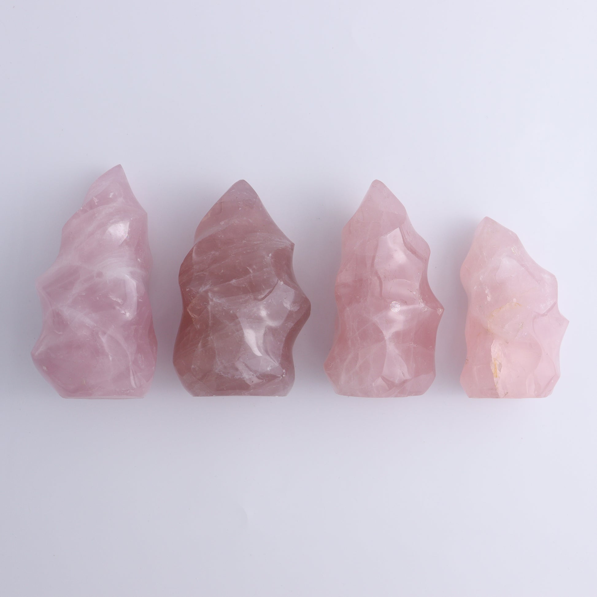 Rose Quartz Flames Set of 4 - Expert Wholesale and Supplier of Wholesale Crystals & Bulk Gemstones, ["flames","Madagascar","Quartz","Rose Quartz"]