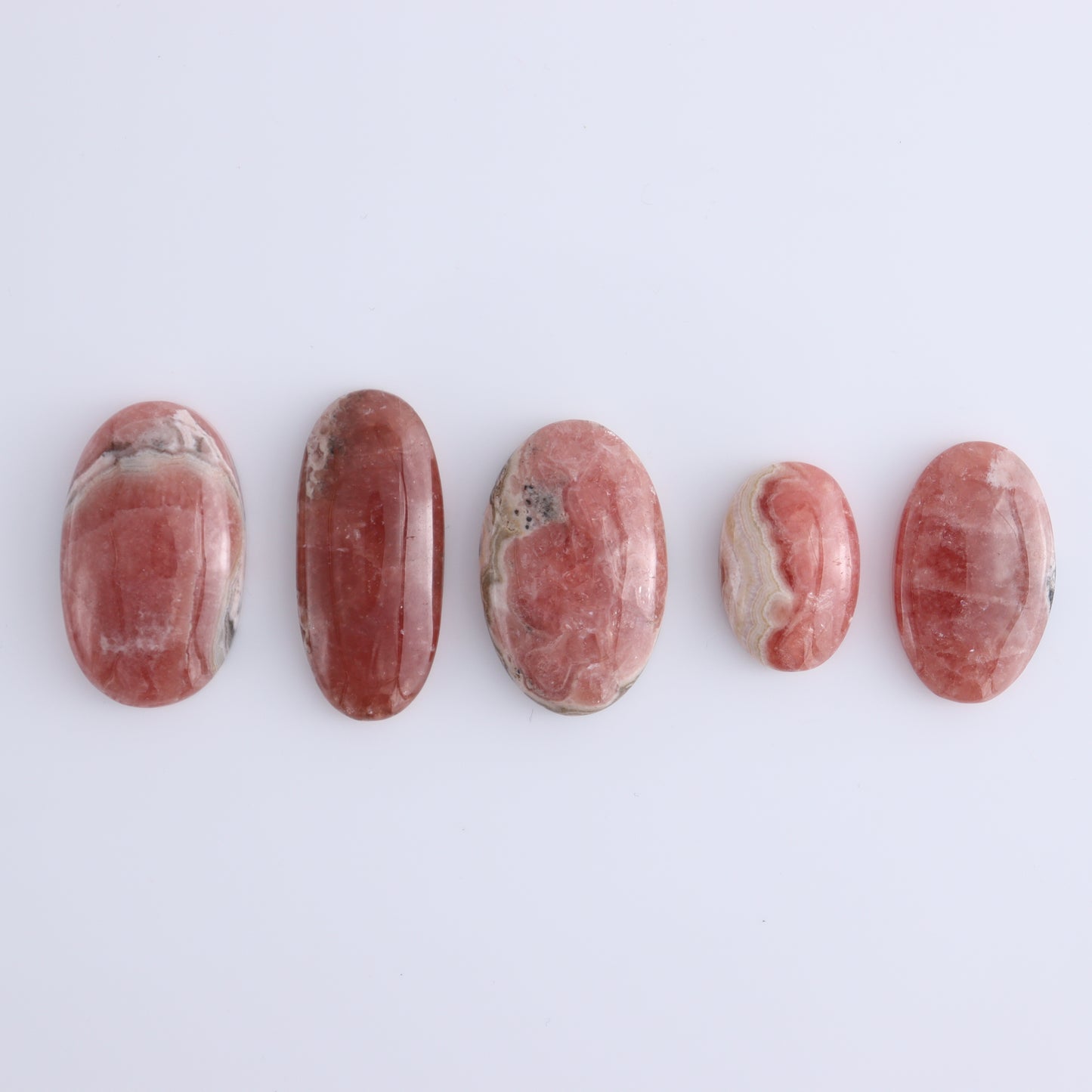 Rhodochrosite Oval Cabs Set of 8 - Expert Wholesale and Supplier of Wholesale Crystals & Bulk Gemstones, ["Argentina","Cabs","Oval","Rhodochrosite"]