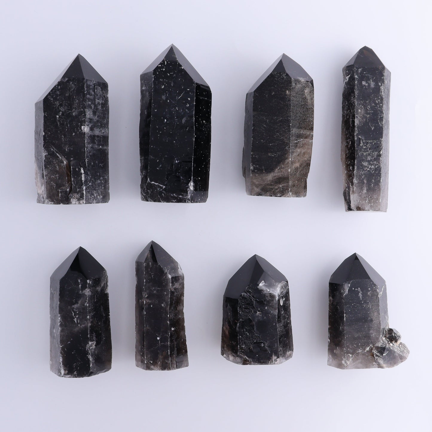 Dark Smoky Quartz Towers Set of 8 - Expert Wholesale and Supplier of Wholesale Crystals & Bulk Gemstones, ["close_70","Points","Quartz","Smoky Quartz","Towers"]