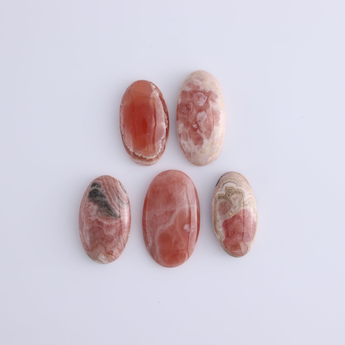 Rhodochrosite Oval Cabs Set of 8 - Expert Wholesale and Supplier of Wholesale Crystals & Bulk Gemstones, ["Argentina","Cabs","Oval","Rhodochrosite"]