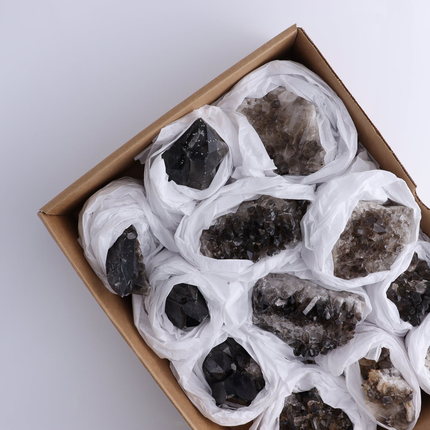 Smoky Quartz Clusters Set of 12 - Expert Wholesale and Supplier of Wholesale Crystals & Bulk Gemstones, ["Brazil","close_70","cluster","Clusters","Quartz","Smoky Quartz"]