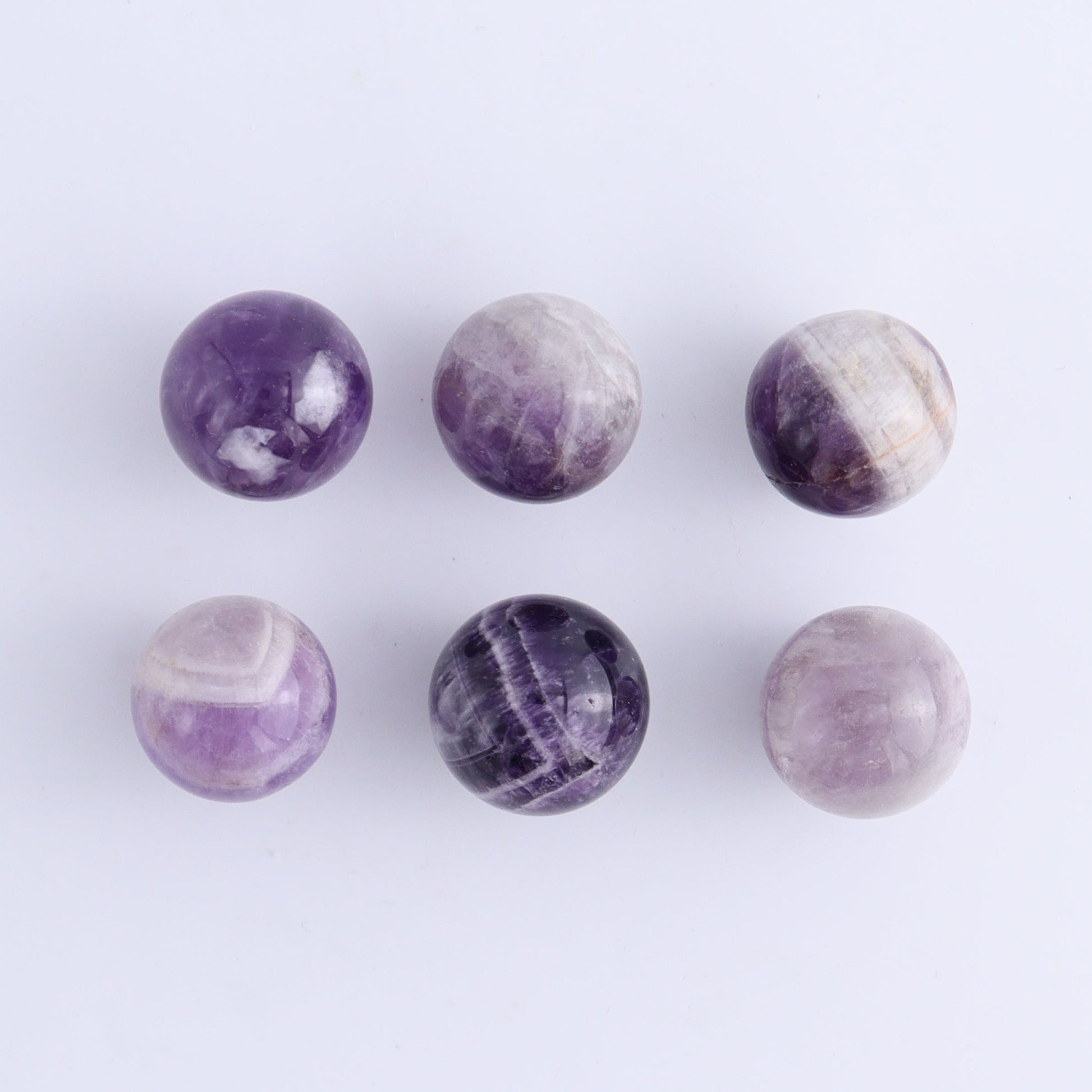 One Mini Amethyst Sphere - Expert Wholesale and Supplier of Wholesale Crystals & Bulk Gemstones, ["Amethyst","Madagascar","Spheres"]