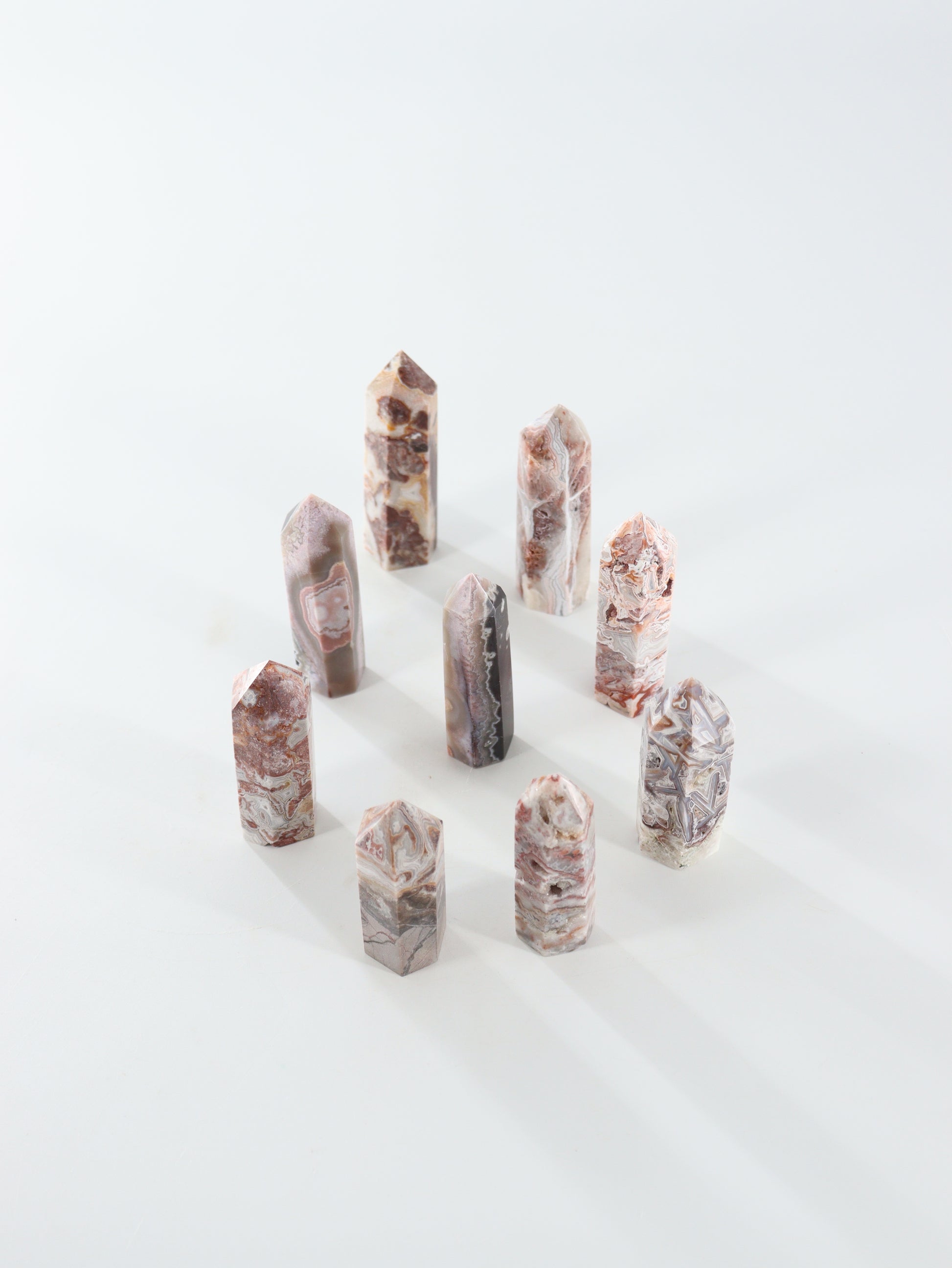 Crazy Lace Agate Towers Set of 9 - Expert Wholesale and Supplier of Wholesale Crystals & Bulk Gemstones, []
