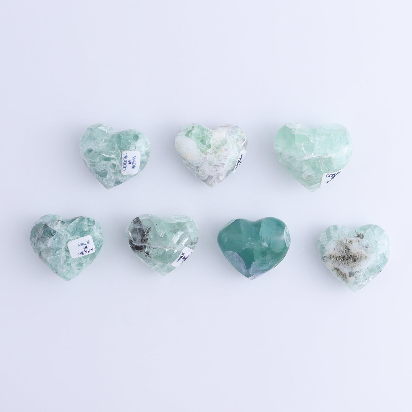 Fluorite Hearts Set of 7 - Expert Wholesale and Supplier of Wholesale Crystals & Bulk Gemstones, ["Fluorite","Hearts","Mexico"]