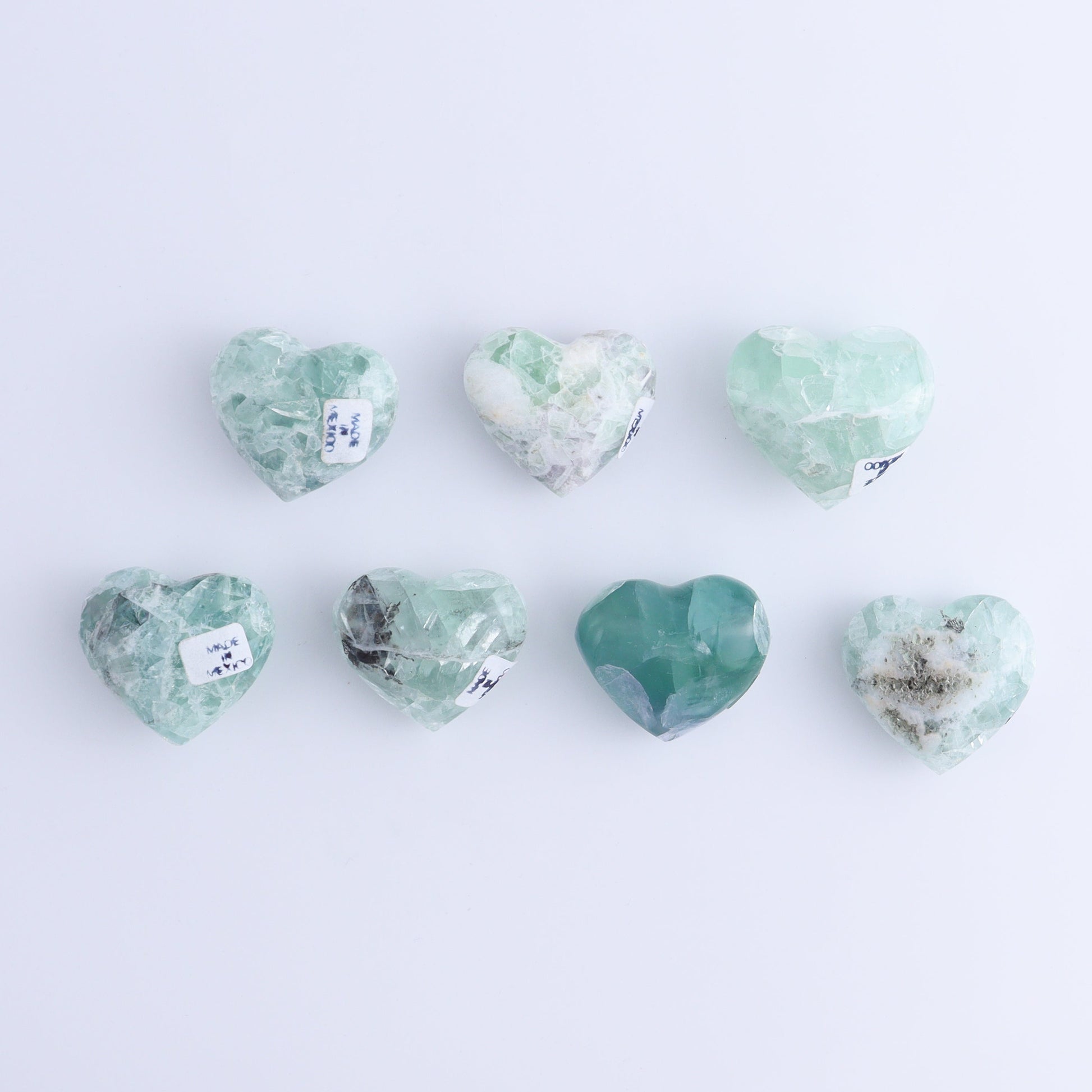 Fluorite Hearts Set of 7 - Expert Wholesale and Supplier of Wholesale Crystals & Bulk Gemstones, ["Fluorite","Hearts","Mexico"]