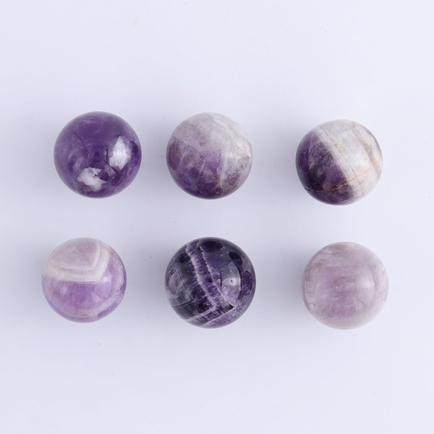One Mini Amethyst Sphere - Expert Wholesale and Supplier of Wholesale Crystals & Bulk Gemstones, ["Amethyst","Madagascar","Spheres"]