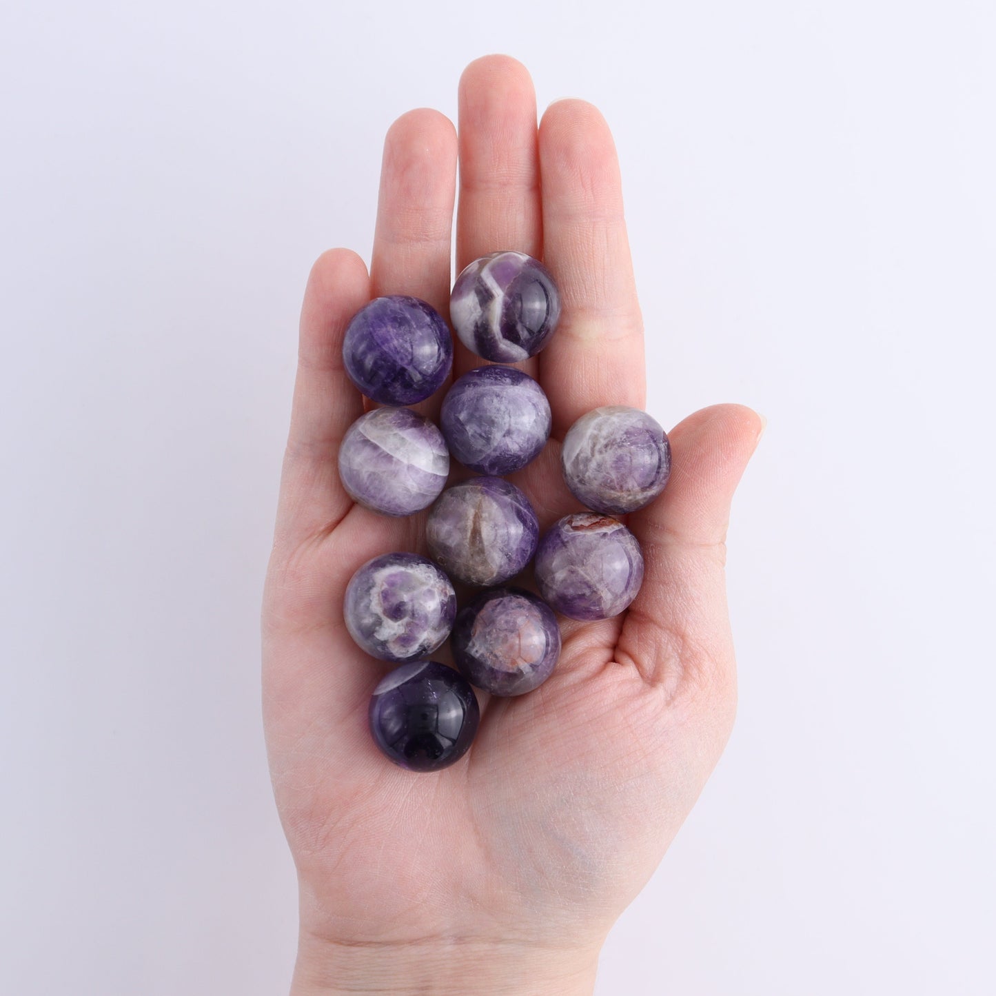 One Mini Amethyst Sphere - Expert Wholesale and Supplier of Wholesale Crystals & Bulk Gemstones, ["Amethyst","Madagascar","Spheres"]