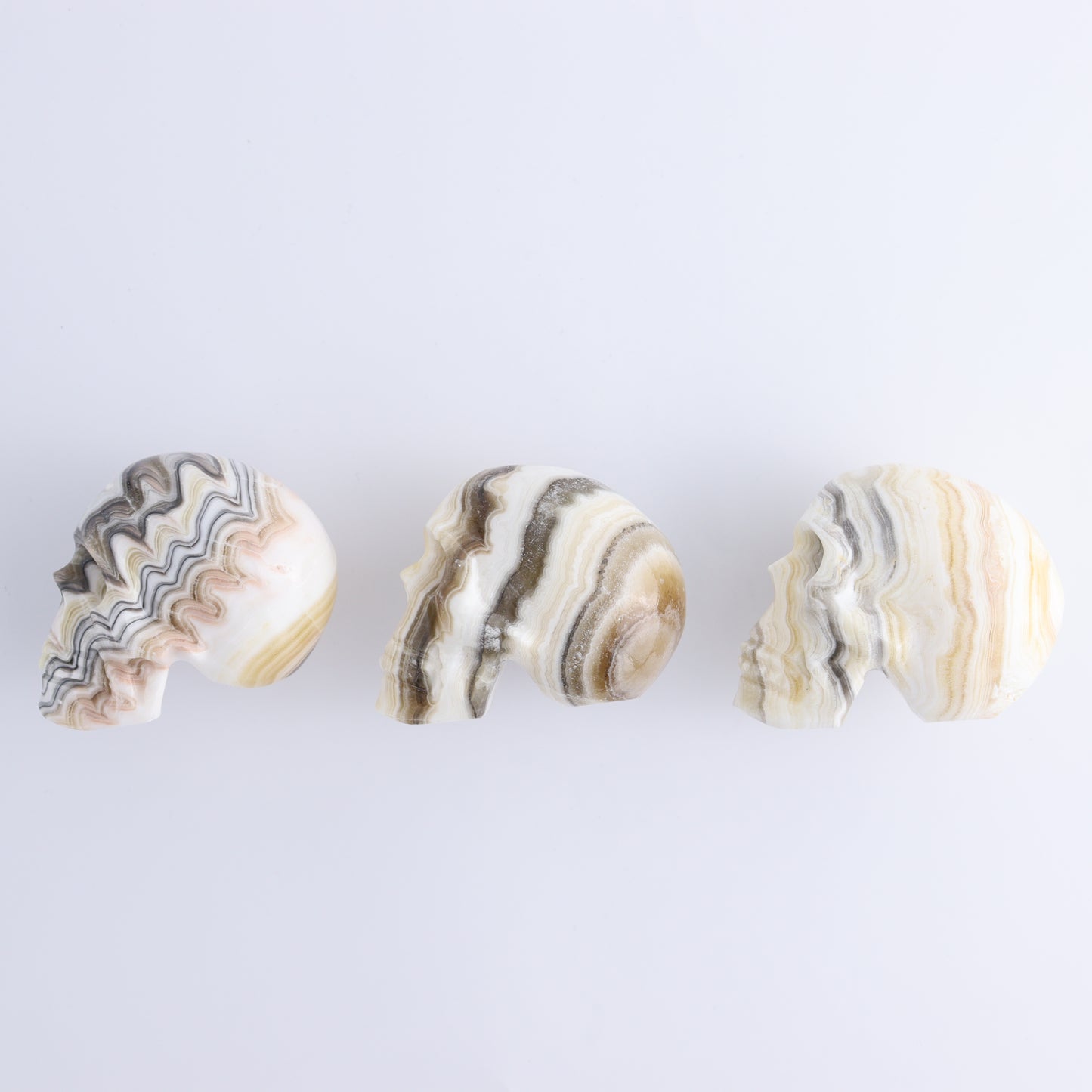 Onyx Skulls Set of 3 - Expert Wholesale and Supplier of Wholesale Crystals & Bulk Gemstones, ["Mexico","onyx","Skulls"]