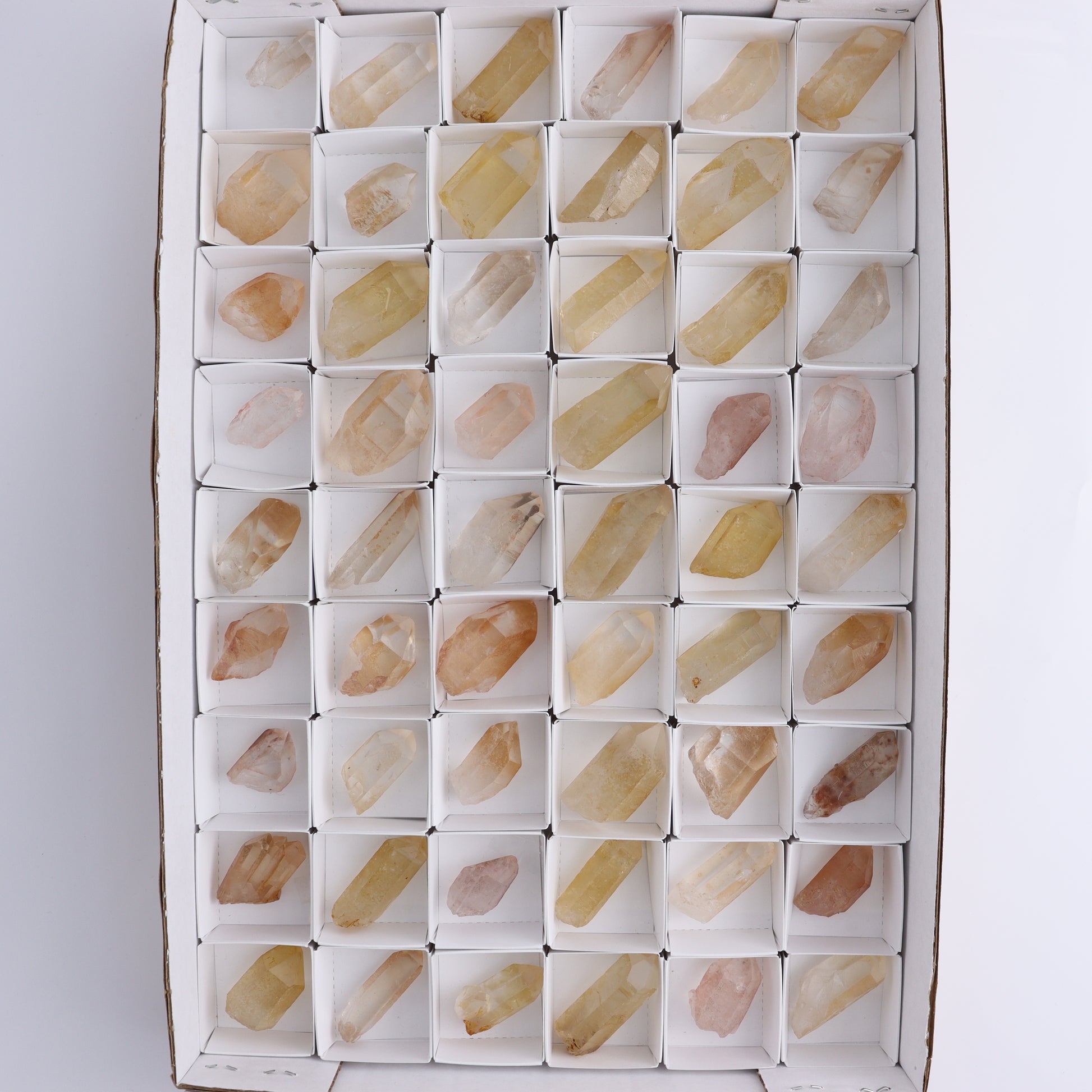 Tangerine Quartz Rough Towers Set of 54 - Expert Wholesale and Supplier of Wholesale Crystals & Bulk Gemstones, ["Quartz","Rough","Tangerine Quartz","Towers"]