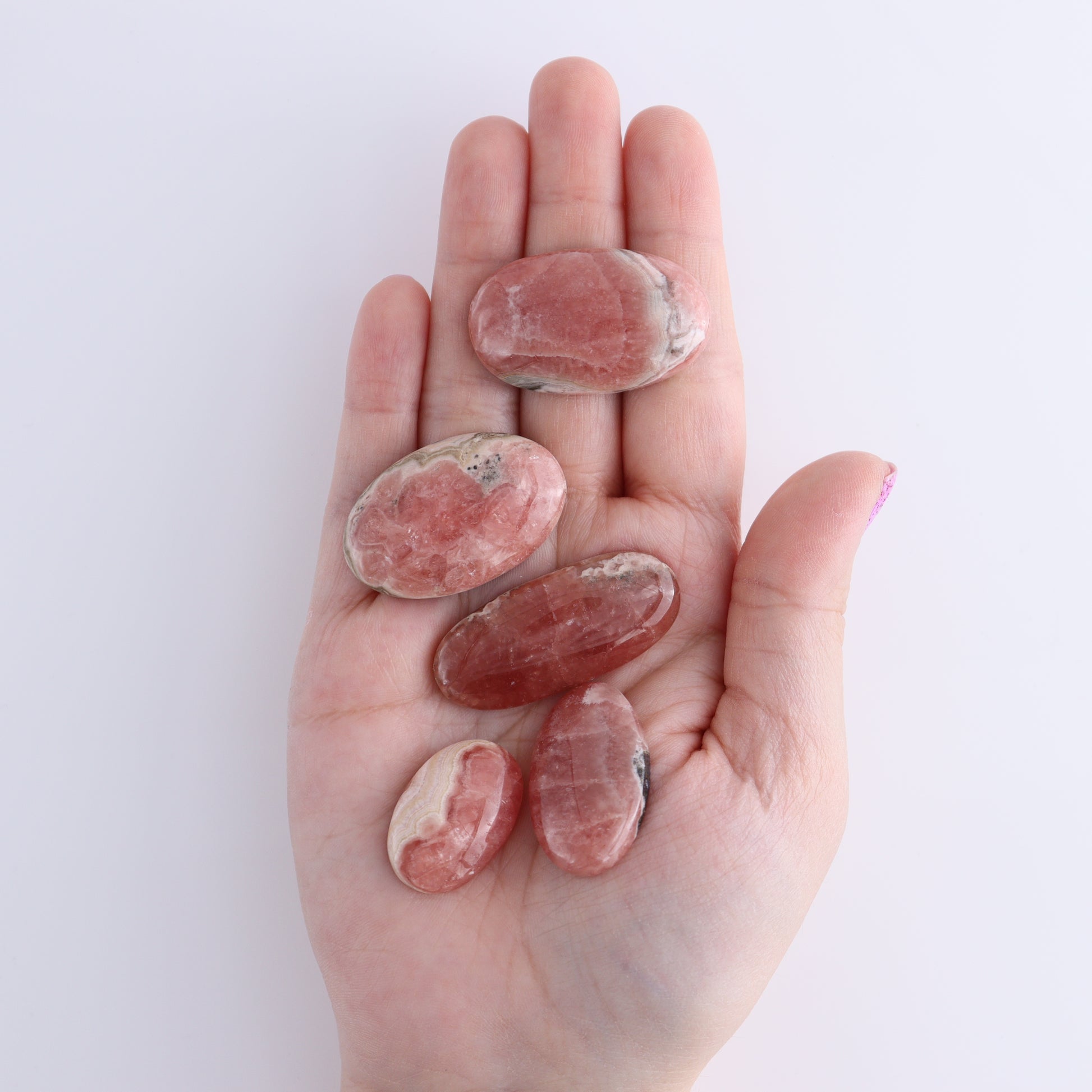 Rhodochrosite Oval Cabs Set of 8 - Expert Wholesale and Supplier of Wholesale Crystals & Bulk Gemstones, ["Argentina","Cabs","Oval","Rhodochrosite"]