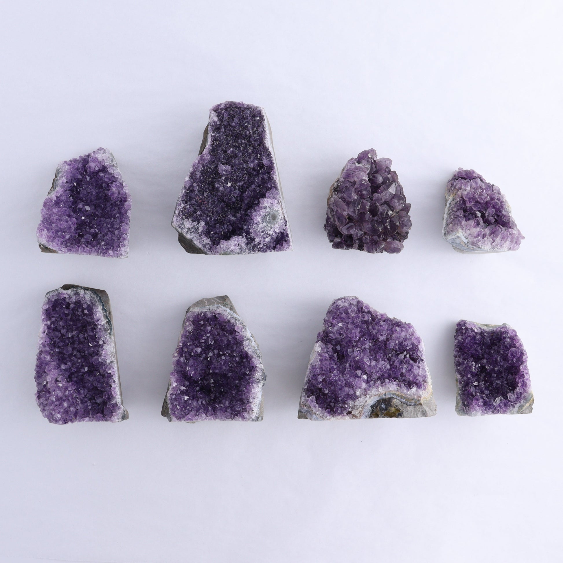 Uruguay Amethyst Cut Base Set of 8 - Expert Wholesale and Supplier of Wholesale Crystals & Bulk Gemstones, ["Amethyst","Cut Base","Uruguay"]